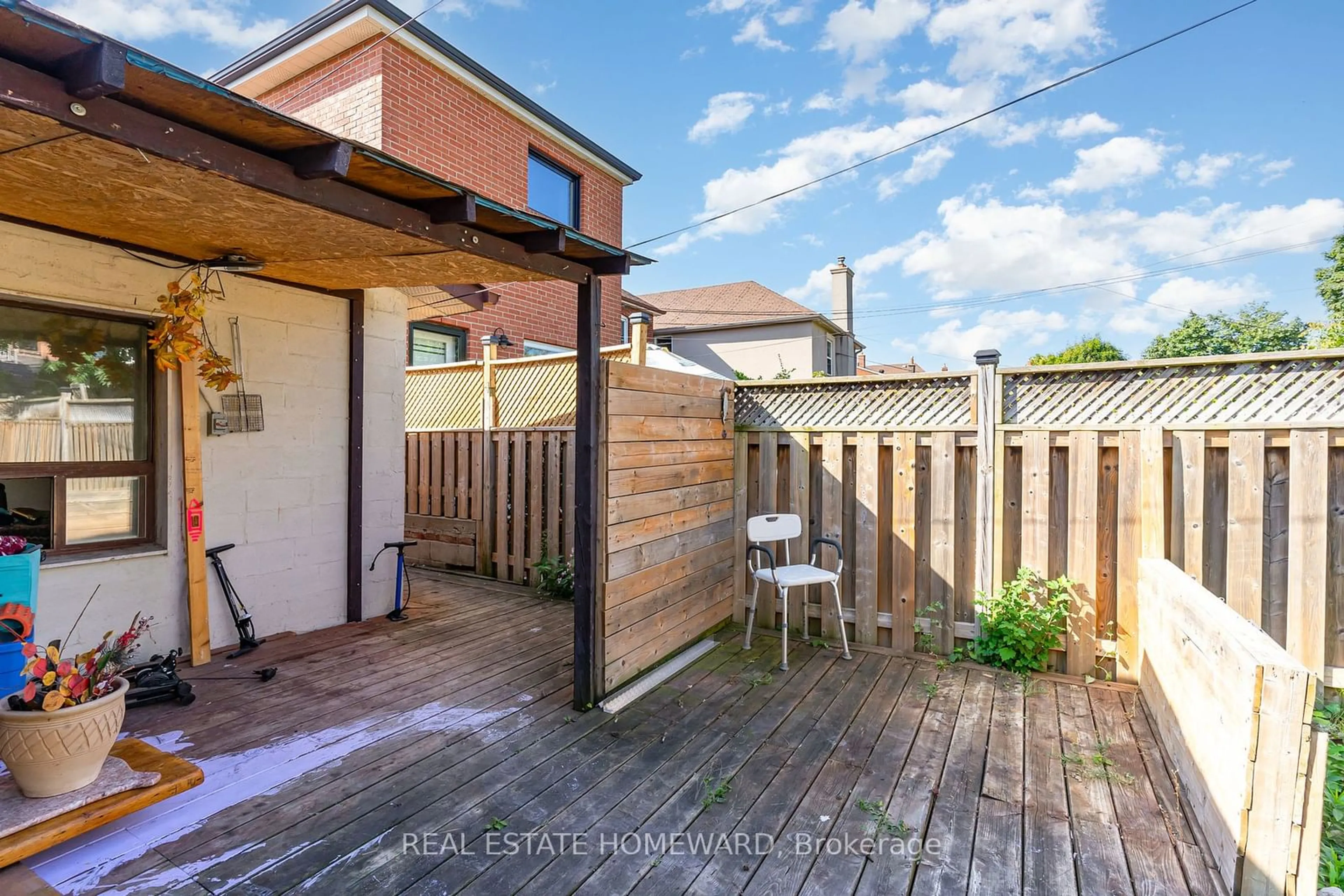 Patio, the fenced backyard for 72 Earlsdale Ave, Toronto Ontario M6C 1L3