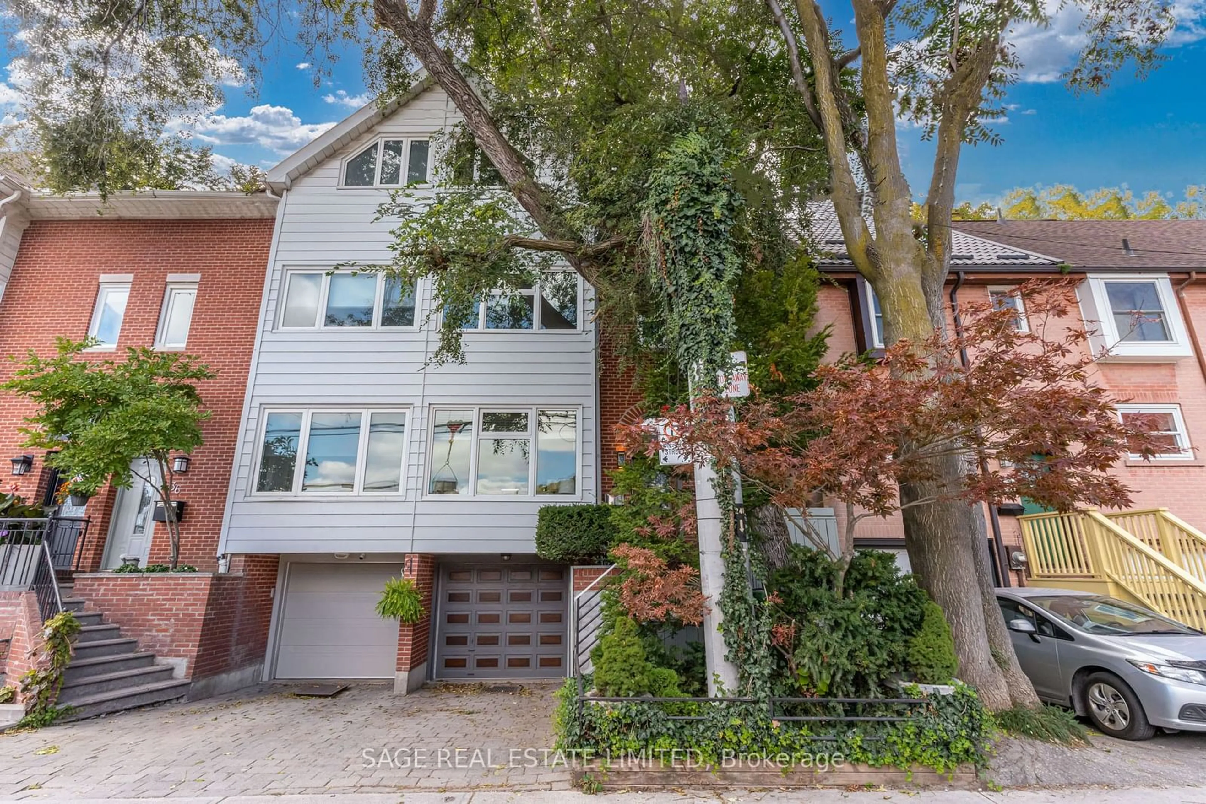 A pic from exterior of the house or condo, the street view for 38 Poulett St, Toronto Ontario M5A 1Z5