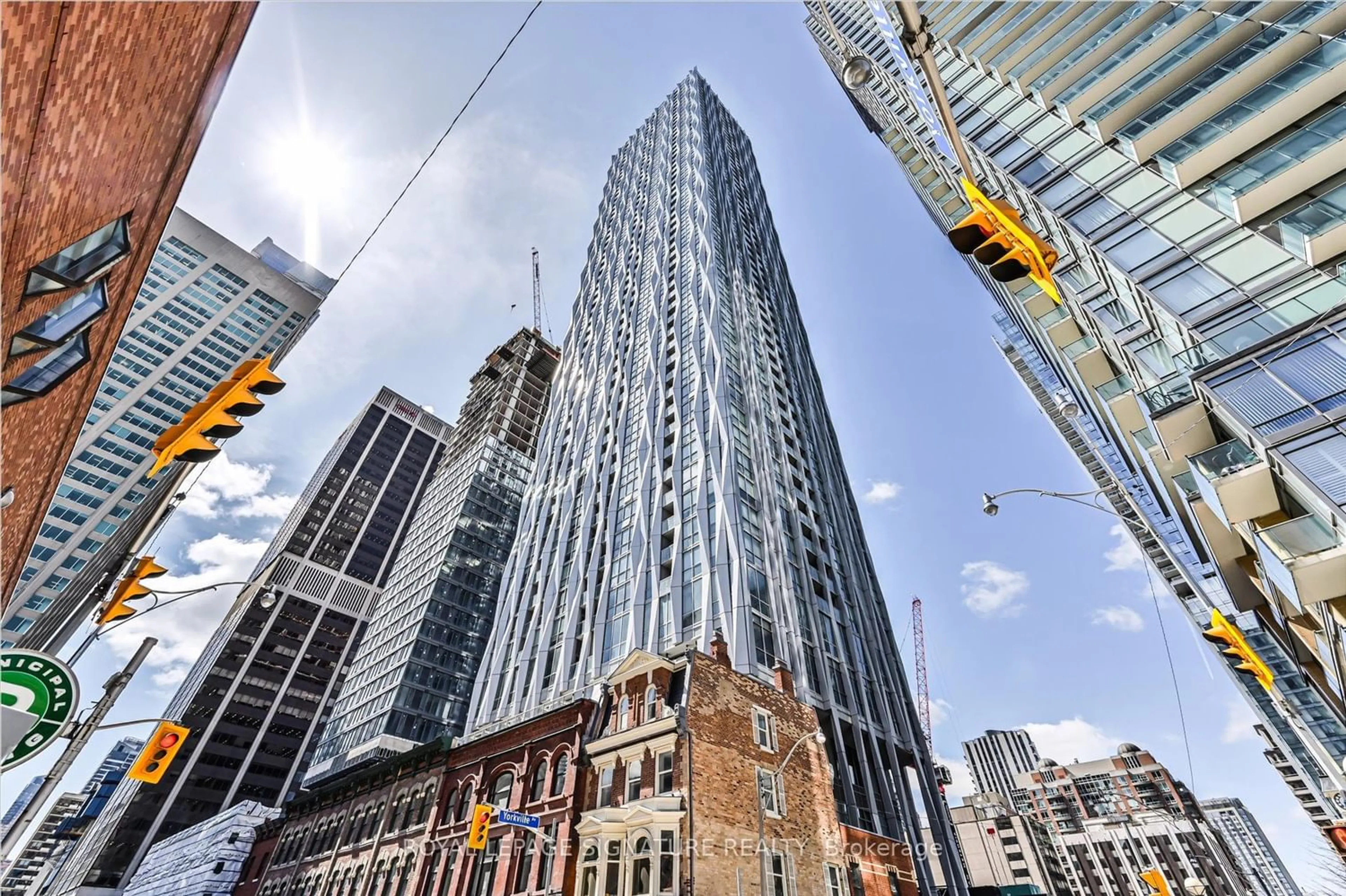 A pic from exterior of the house or condo, the street view for 1 Yorkville Ave #4309, Toronto Ontario M4W 0B1