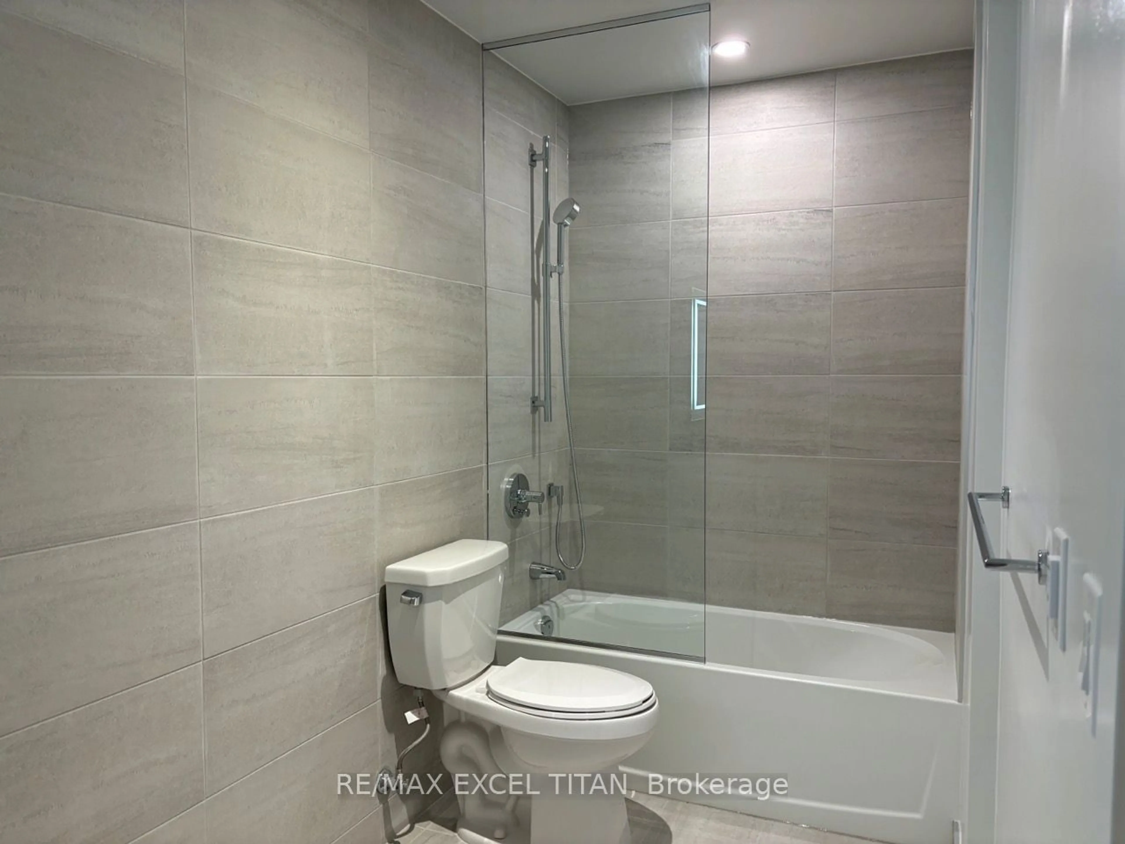 Standard bathroom, ceramic floors for 8 Cumberland St #301, Toronto Ontario M4W 0B6