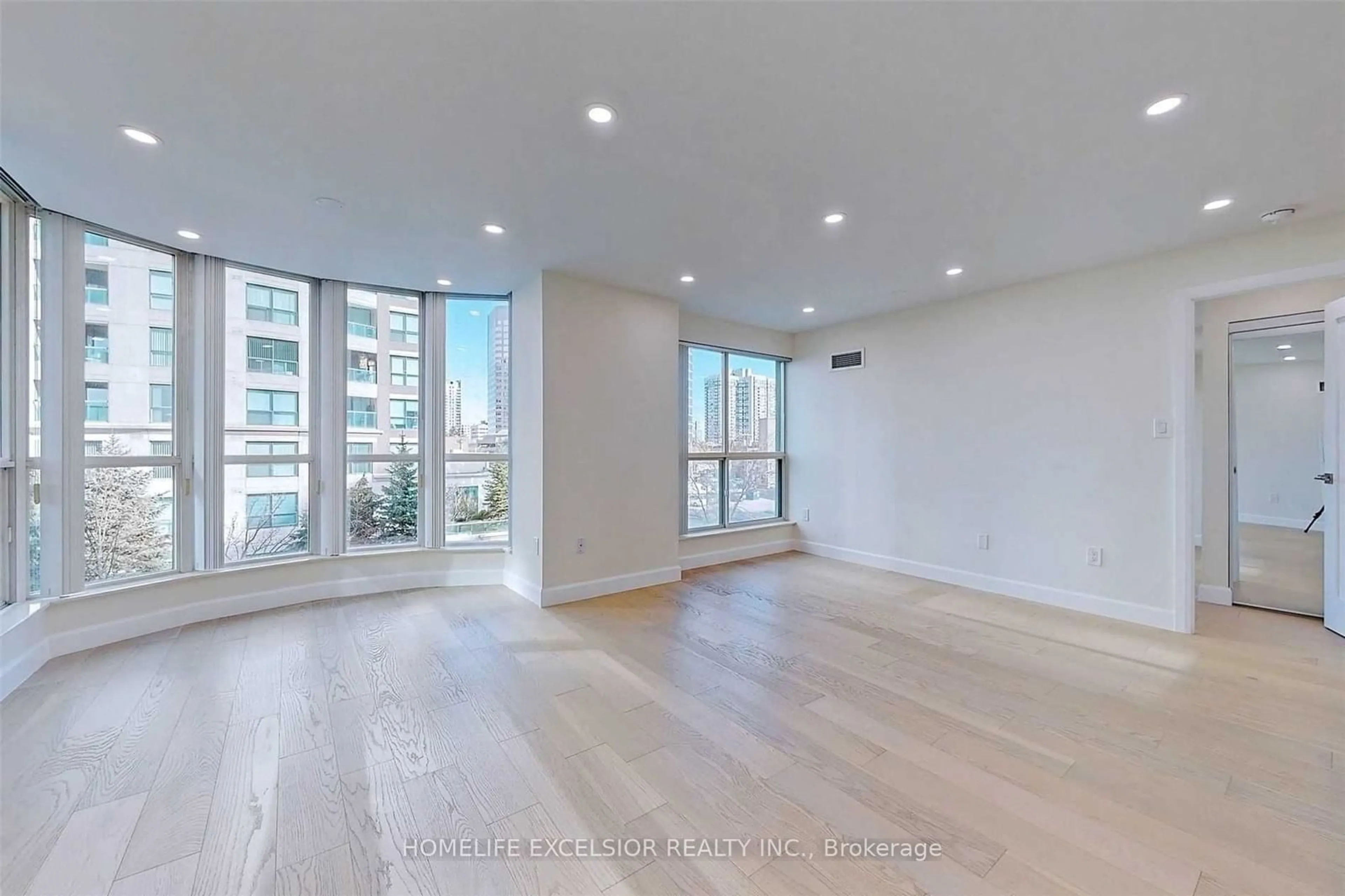 A pic of a room, wood floors for 23 Lorraine Dr #512, Toronto Ontario M2N 6Z6