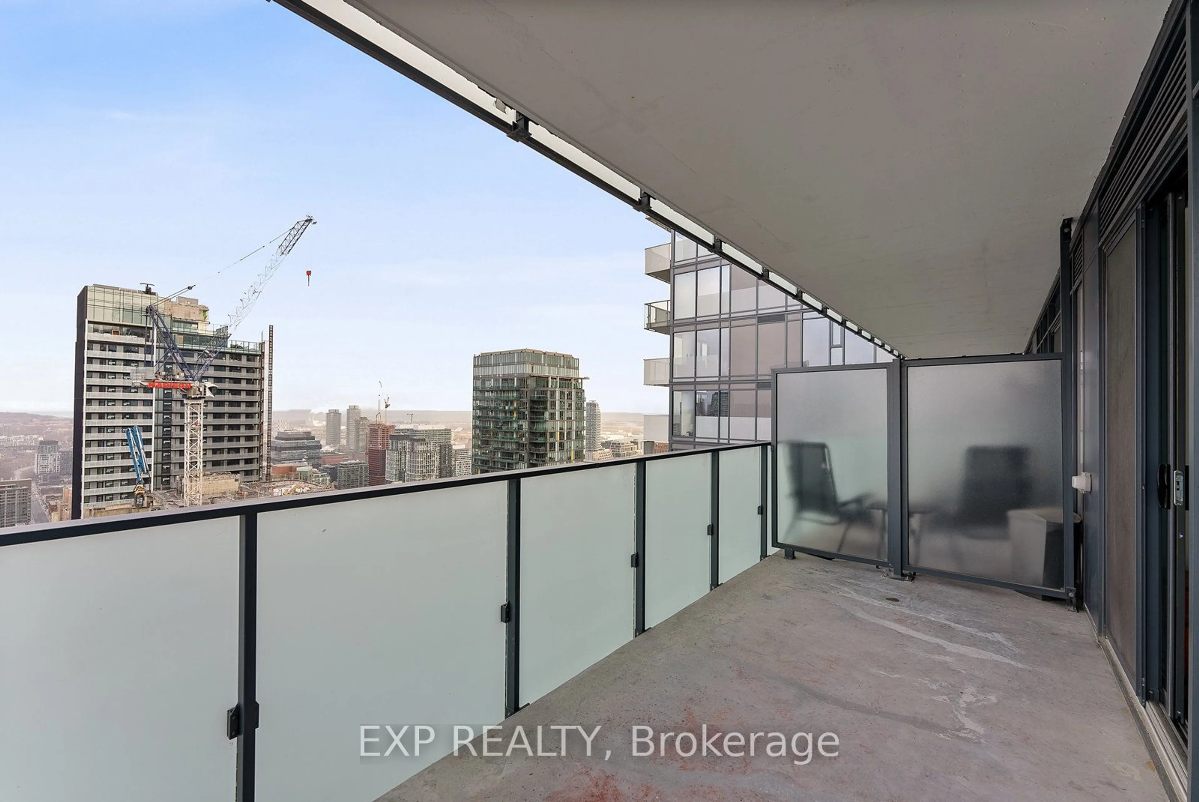 Balcony in the apartment, city buildings view from balcony for 20 Lombard St #4011, Toronto Ontario M5C 0A6