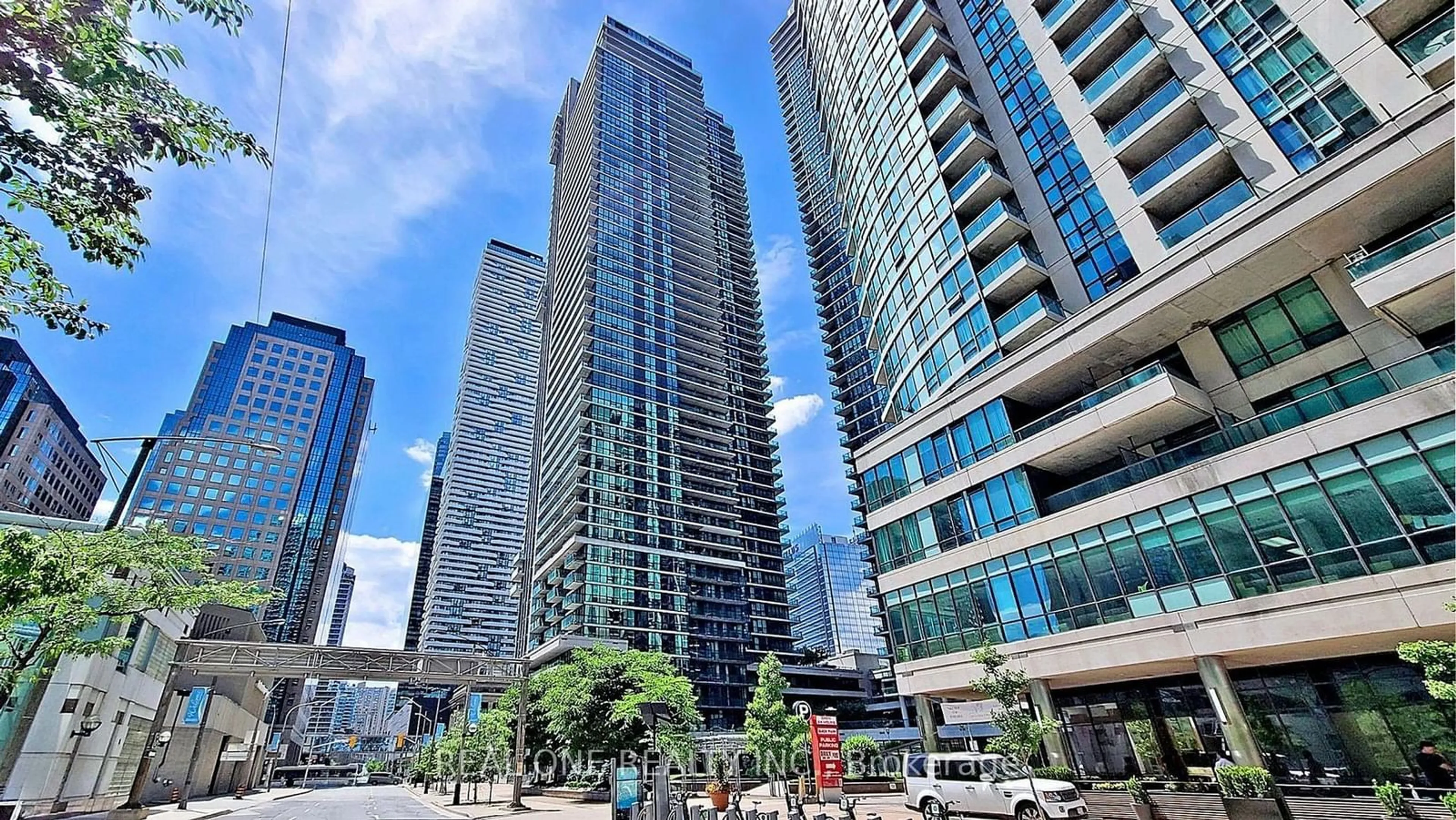 A pic from exterior of the house or condo, the view of city buildings for 33 Bay St #315, Toronto Ontario M5J 2Z3