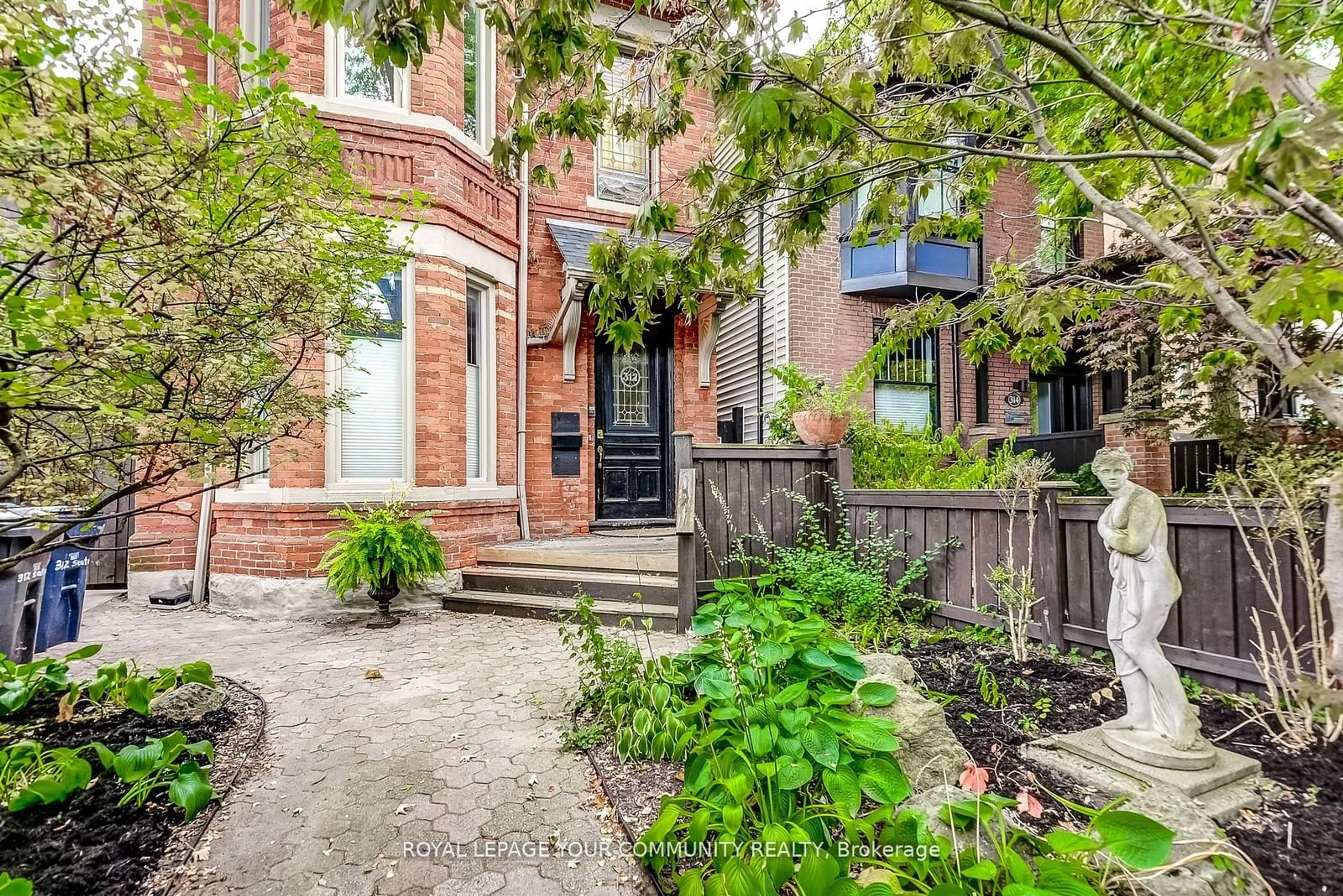 Home with brick exterior material for 312 Seaton St, Toronto Ontario M5A 2T7