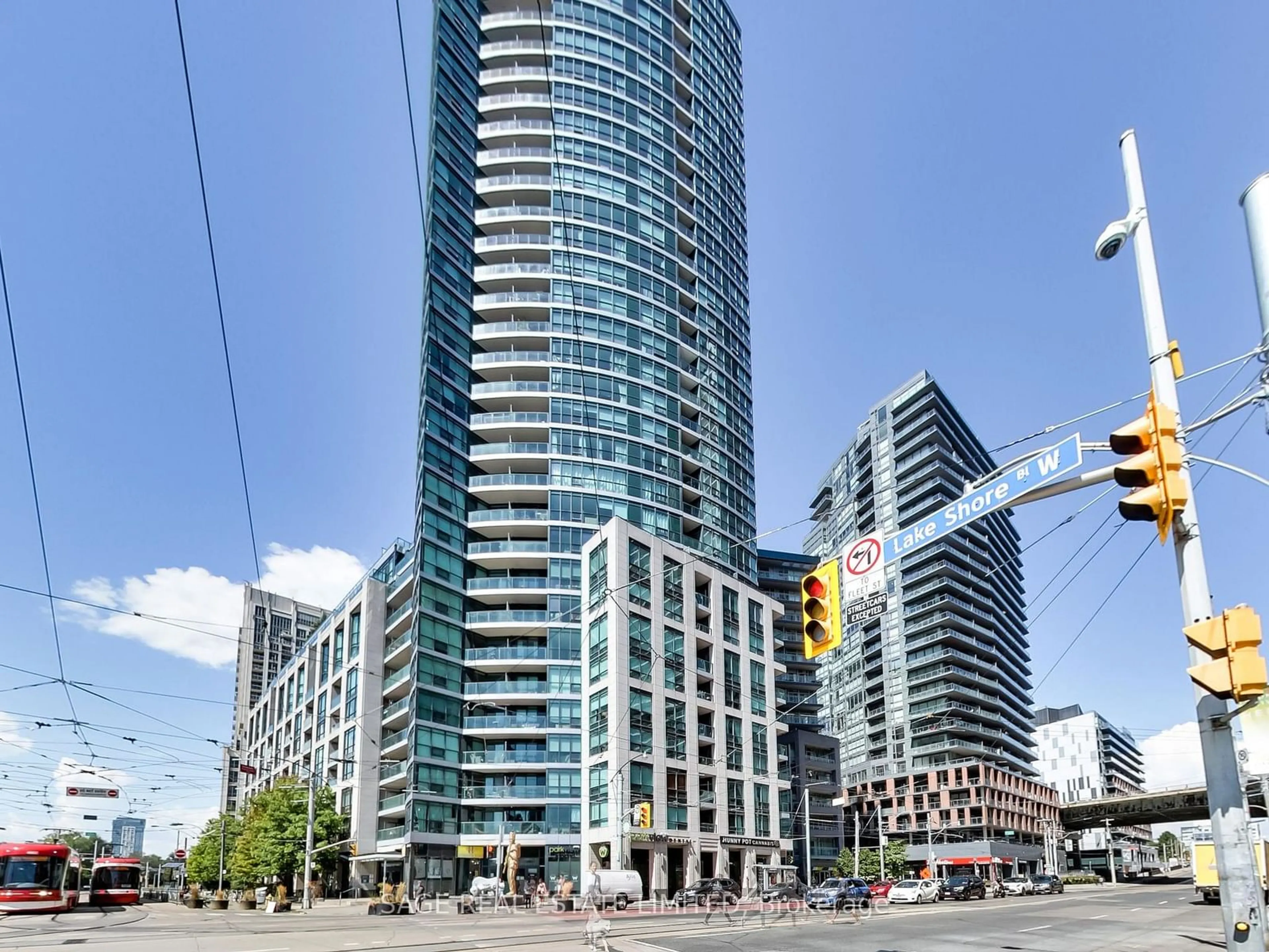 A pic from exterior of the house or condo, the view of city buildings for 600 Fleet St #702, Toronto Ontario M5V 1B7