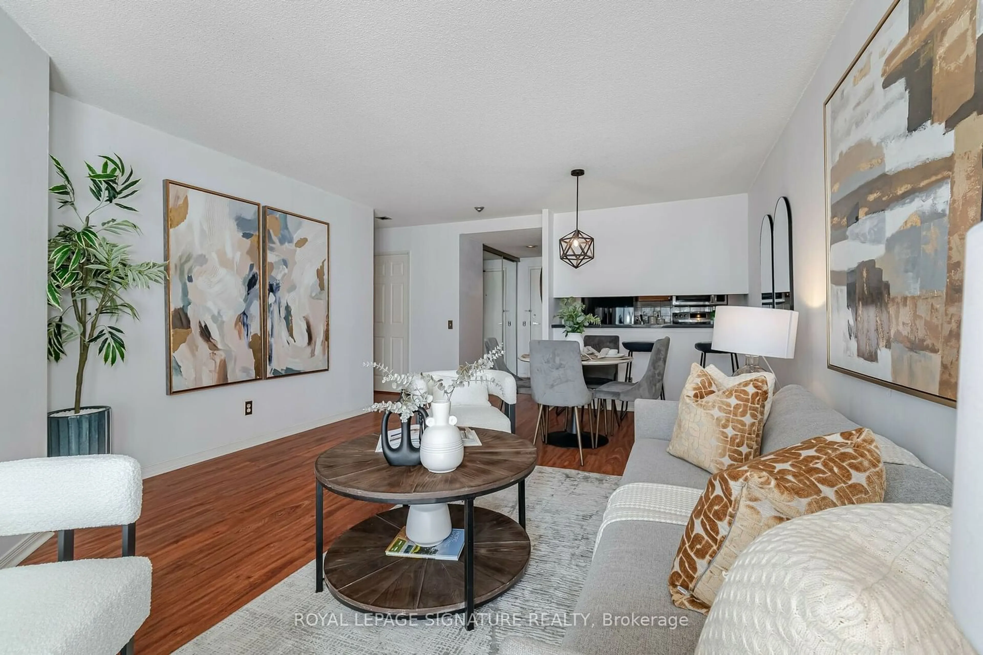 Living room, wood floors for 7 Bishop Ave #1002, Toronto Ontario M2M 4J4