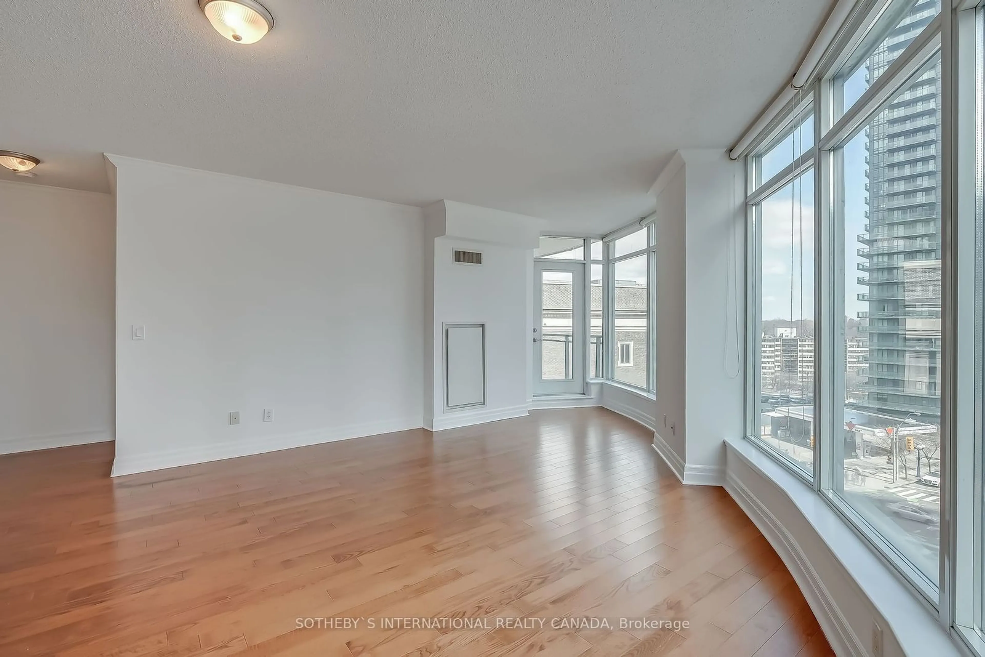 A pic of a room, wood floors for 8 Scollard St #703, Toronto Ontario M5R 1M2