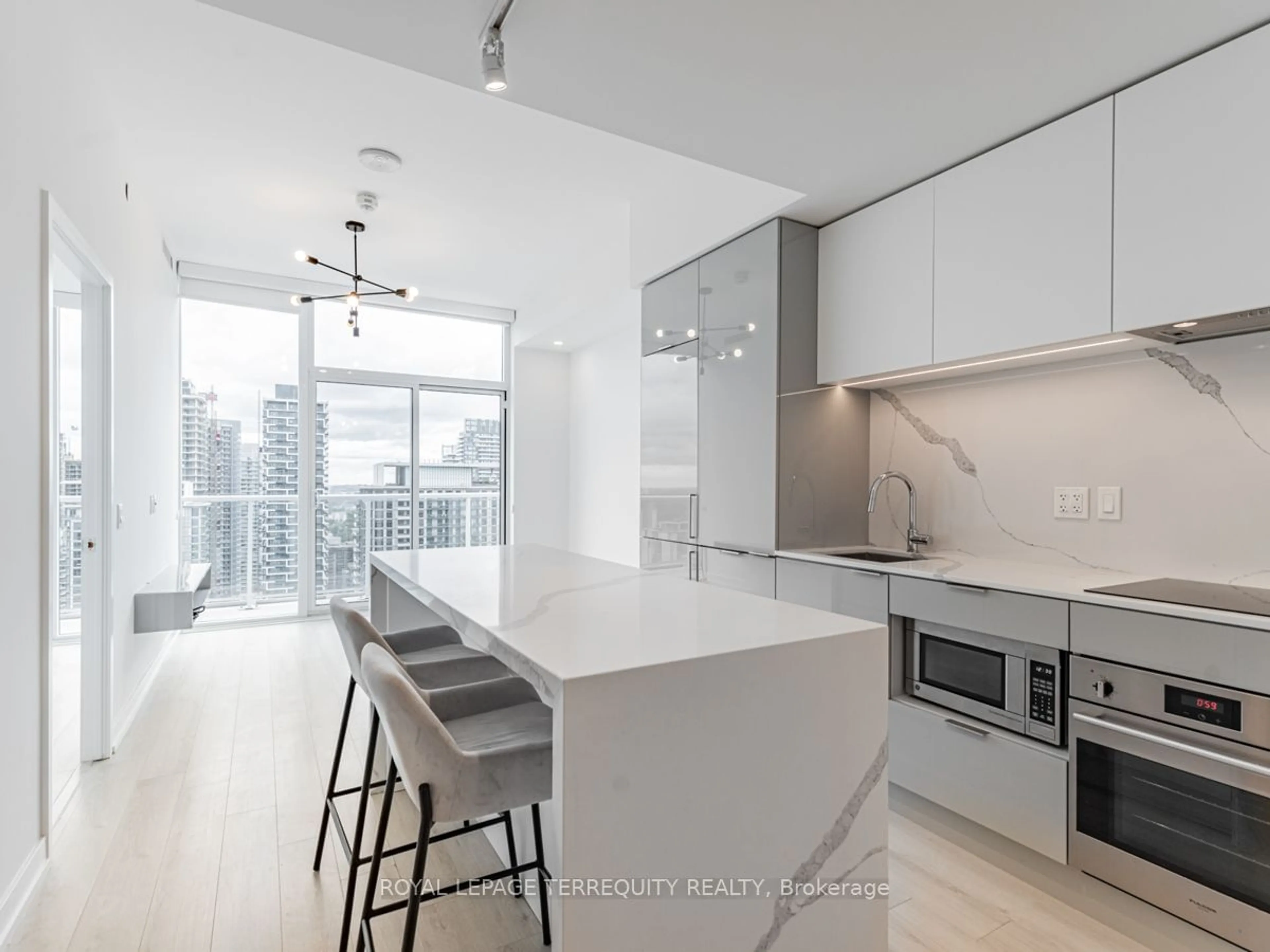 Open concept kitchen for 33 Helendale Ave #2605, Toronto Ontario M4R 0A4