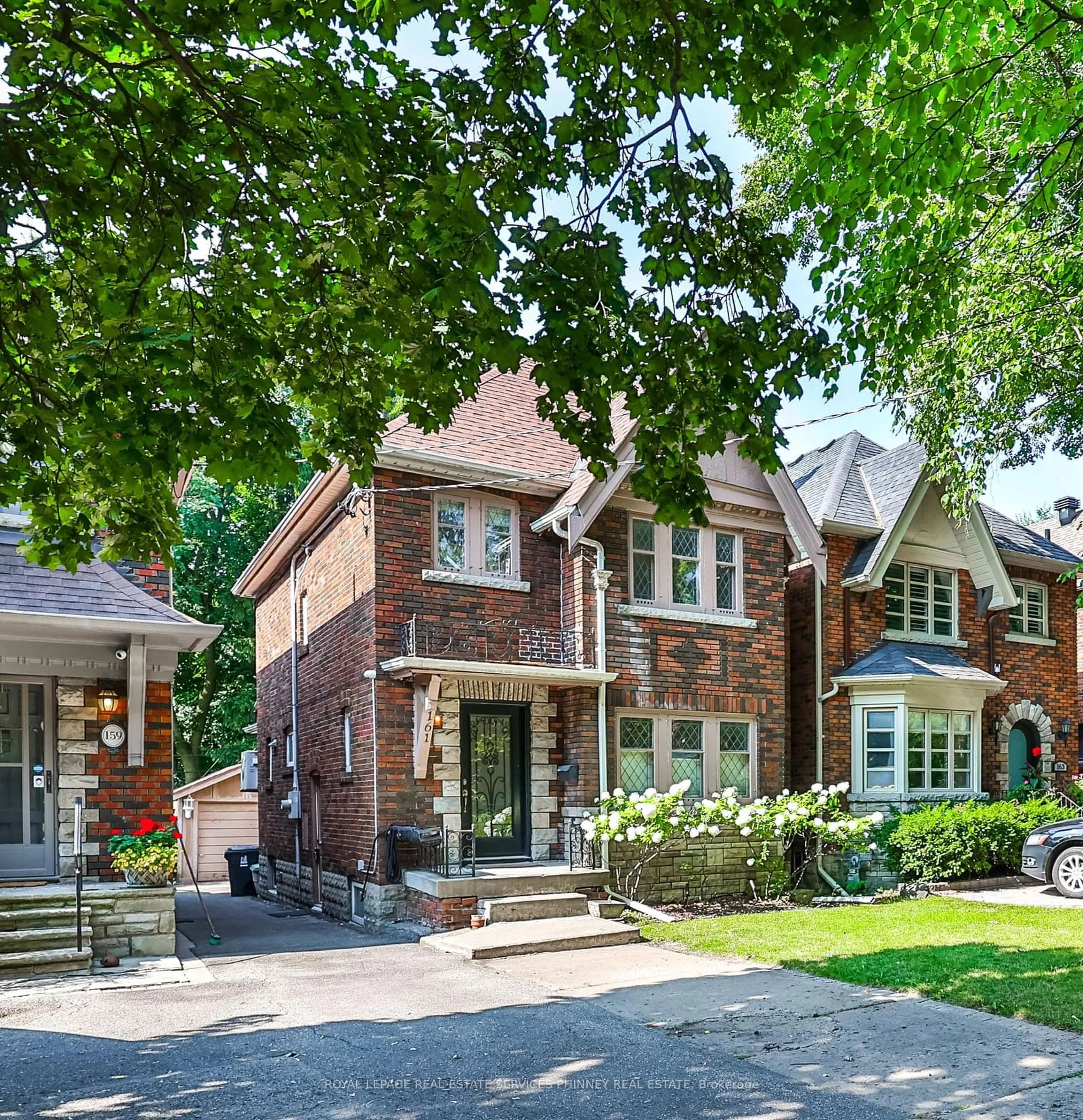 Home with brick exterior material for 161 Chaplin Cres, Toronto Ontario M5P 1B1