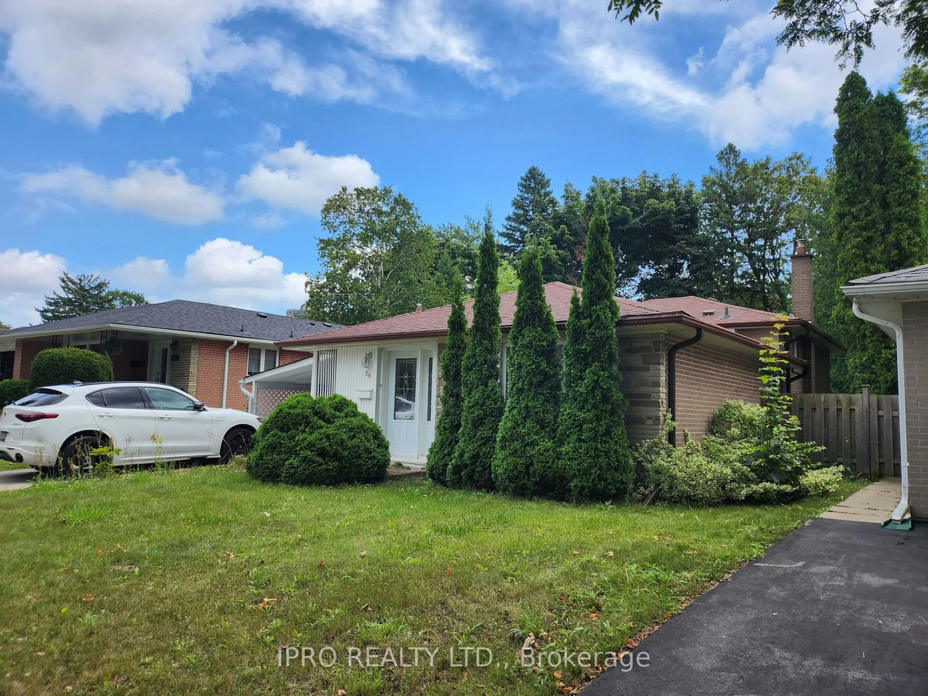 Frontside or backside of a home, the fenced backyard for 16 Cresthaven Dr, Toronto Ontario M2H 1L7