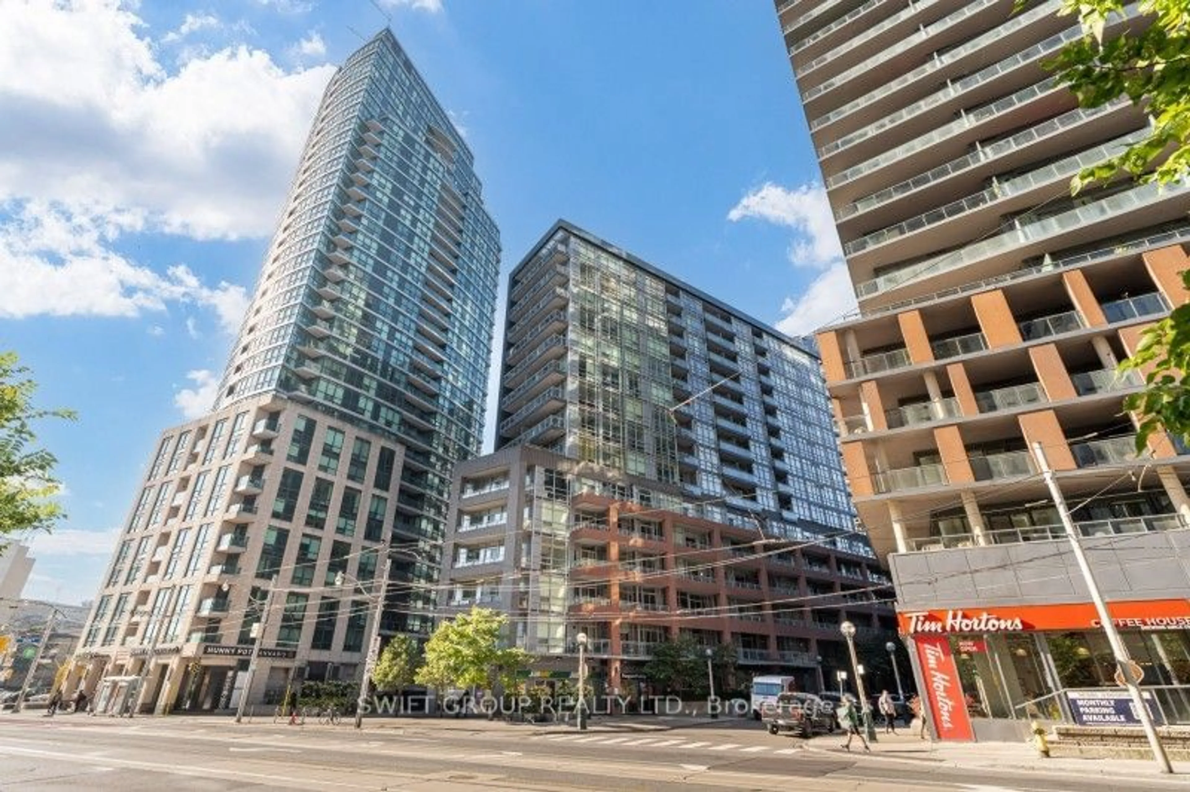 A pic from exterior of the house or condo, the view of city buildings for 15 Bruyeres Mews #210, Toronto Ontario M5V 0A7