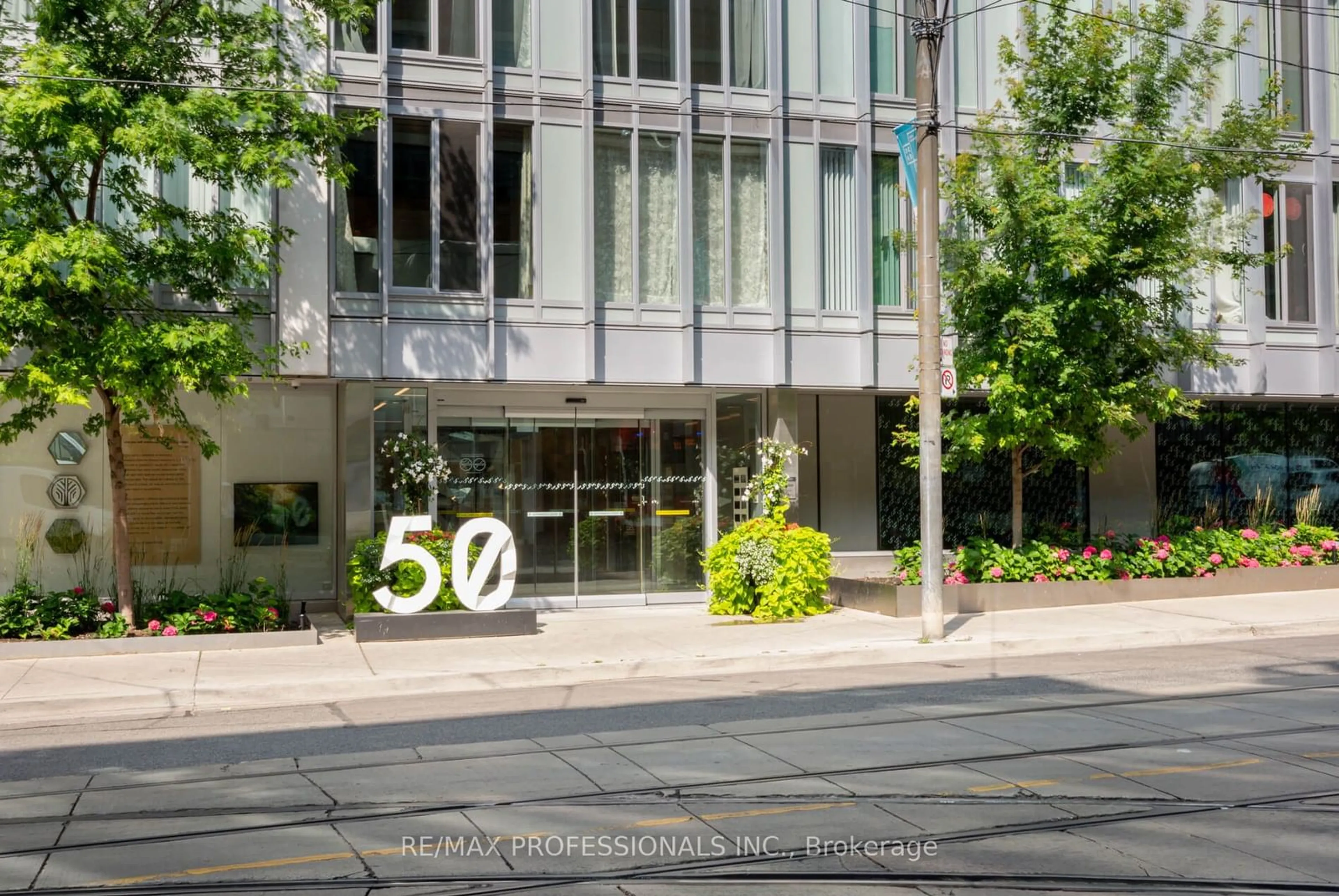 A pic from exterior of the house or condo, the street view for 50 McCaul St #1010, Toronto Ontario M5T 0B6