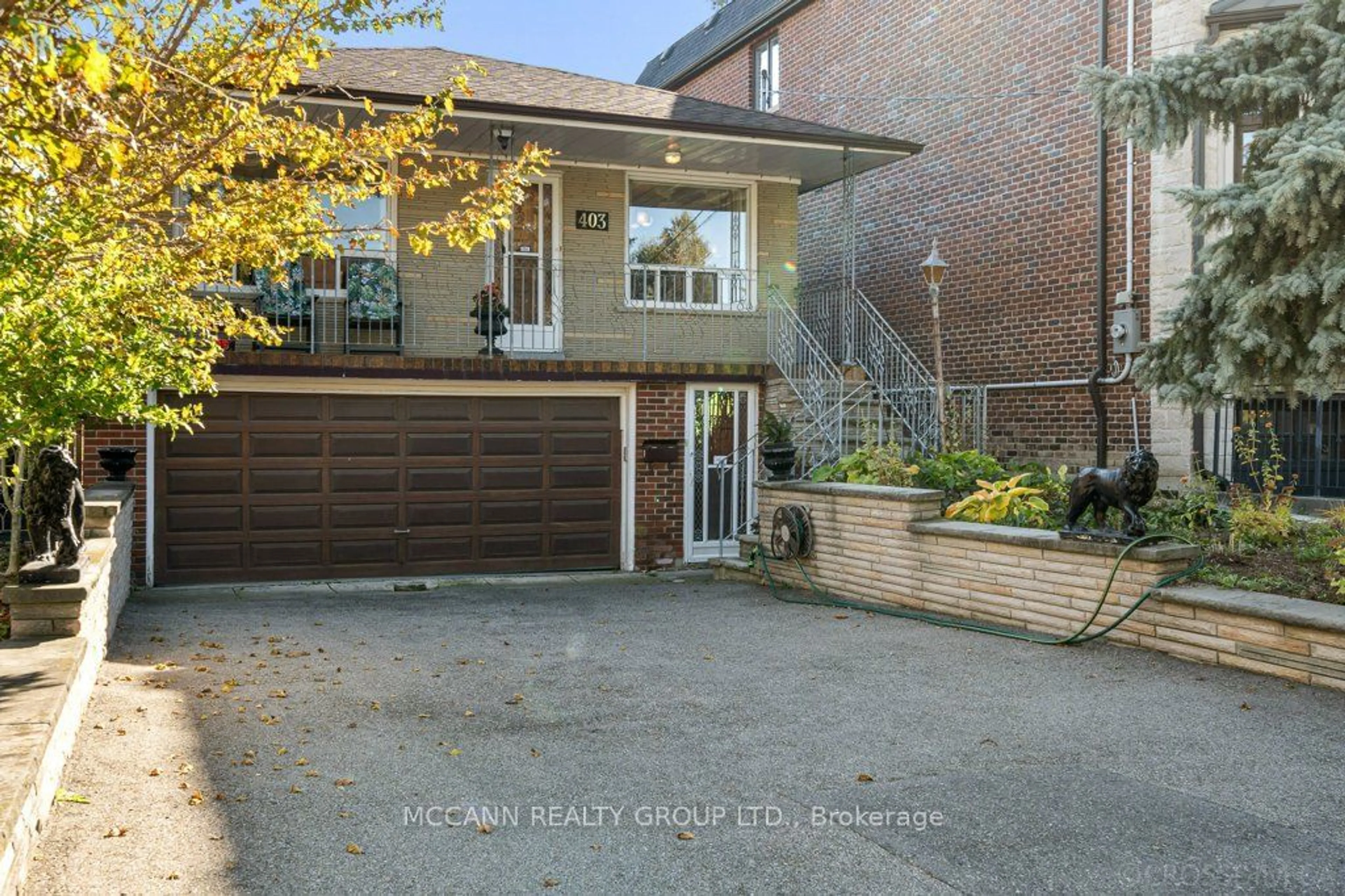 Frontside or backside of a home, the street view for 403 Melrose Ave, Toronto Ontario M5M 1Z6