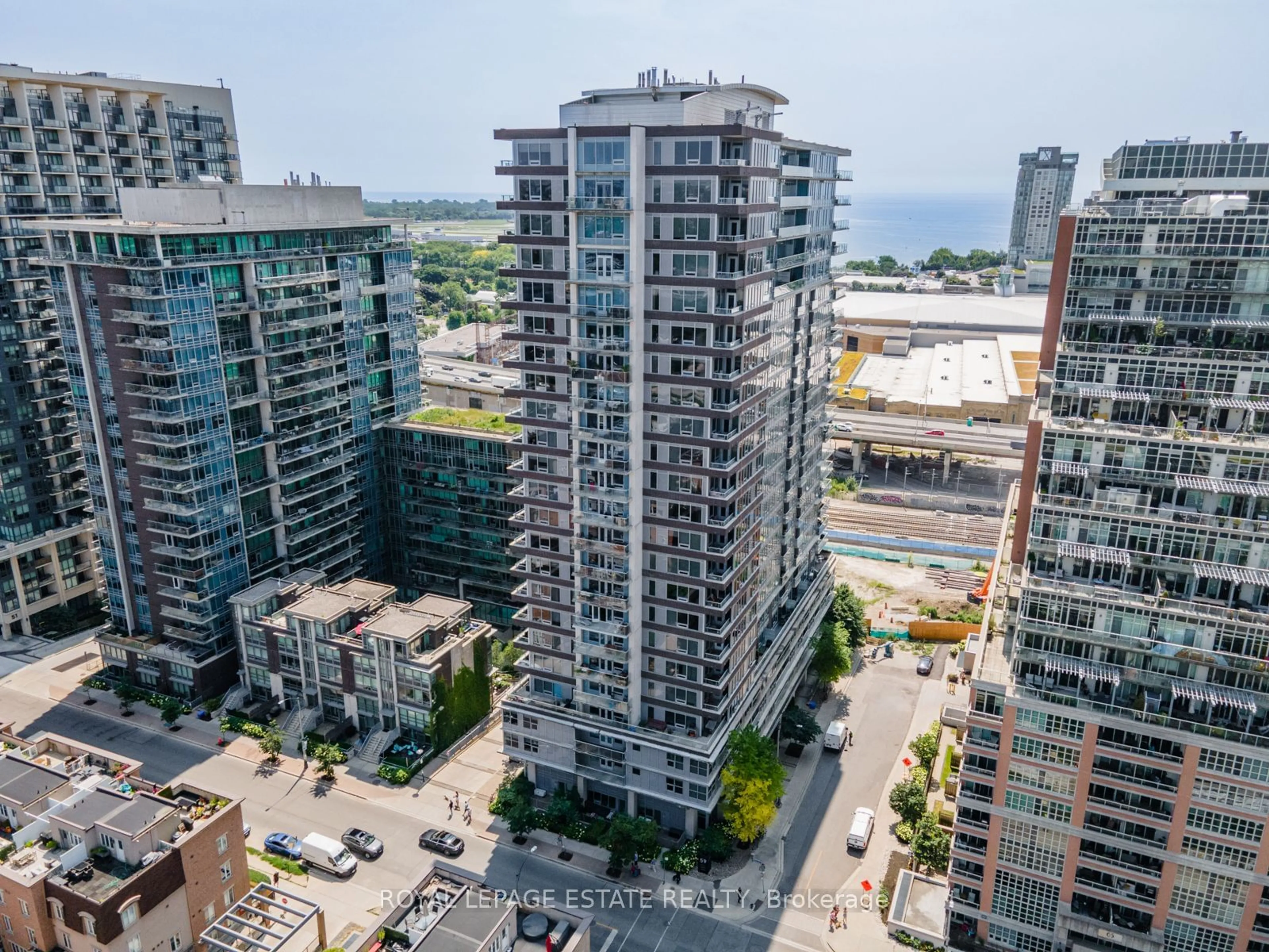 A pic from exterior of the house or condo, the view of city buildings for 59 East Liberty St #711, Toronto Ontario M6K 3R1