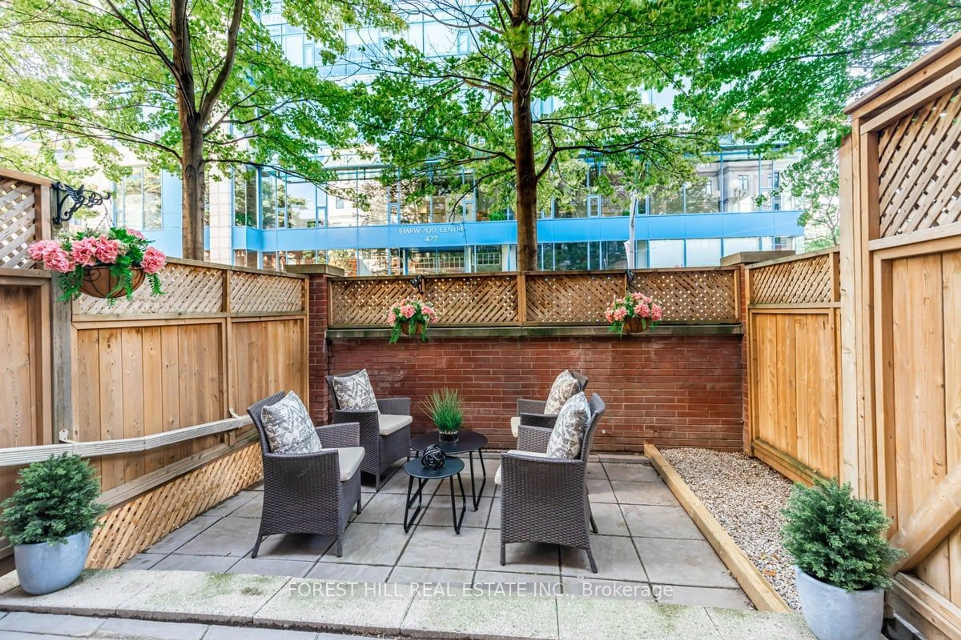 Patio, the fenced backyard for 500 Richmond St #116, Toronto Ontario M5V 3N4