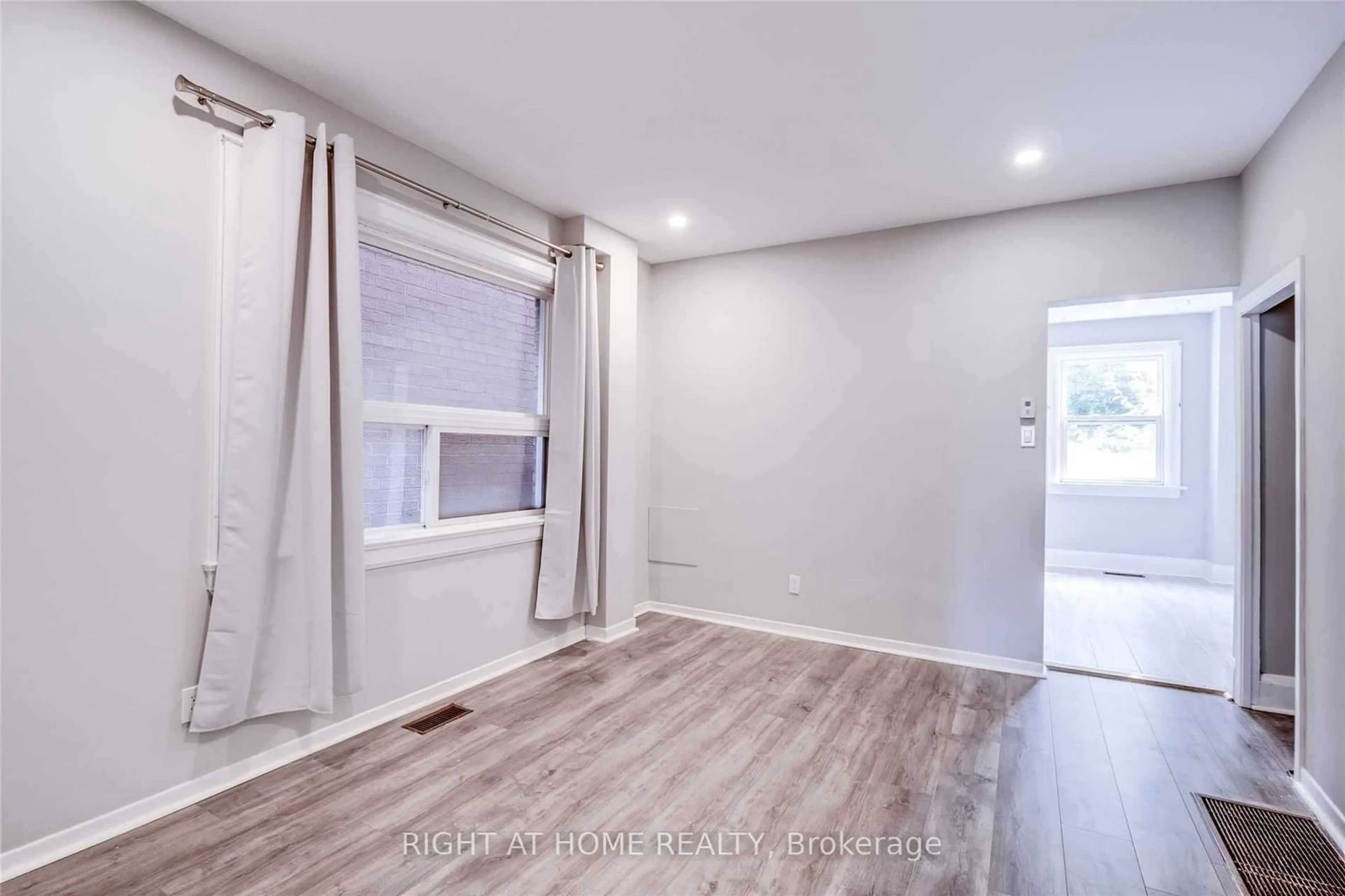 A pic of a room, wood floors for 2023 Dufferin St, Toronto Ontario M6E 3R3