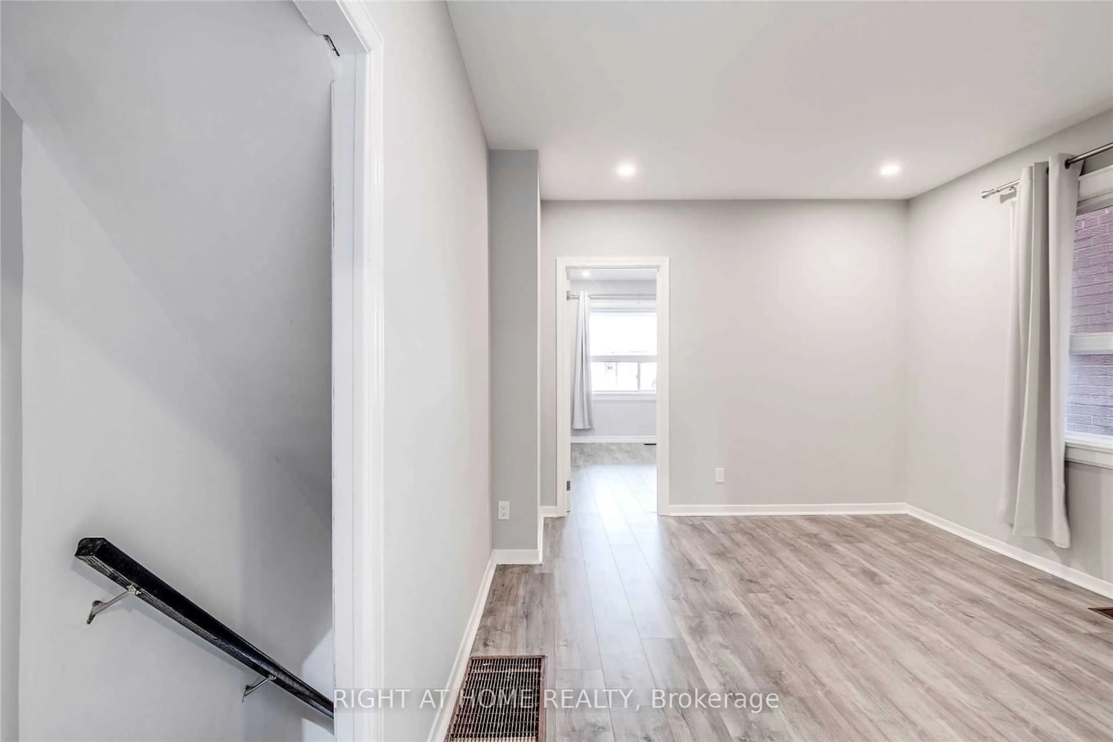 A pic of a room, wood floors for 2023 Dufferin St, Toronto Ontario M6E 3R3