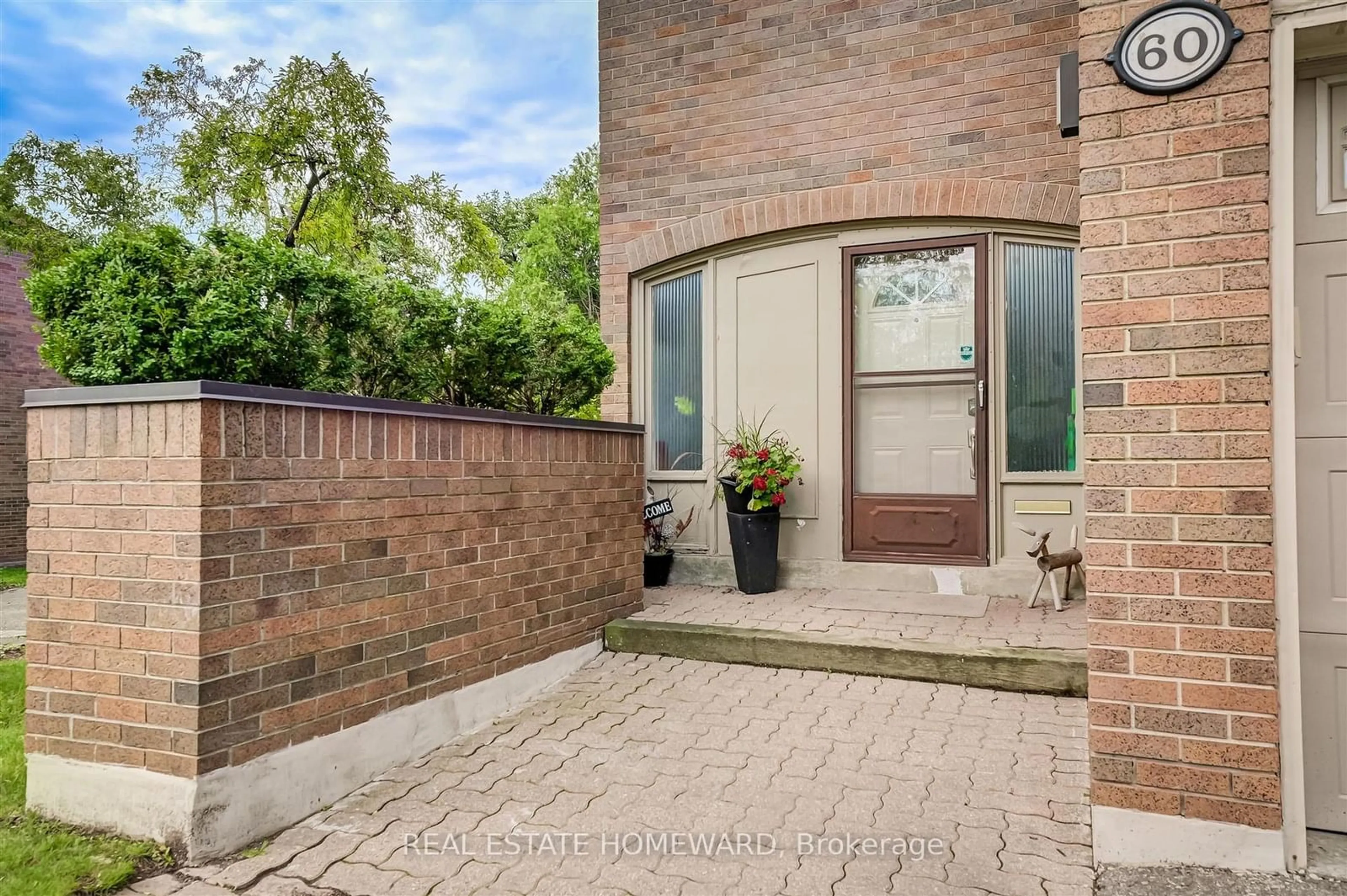 Home with brick exterior material for 60 Flaming Rose Way, Toronto Ontario M2N 5W8