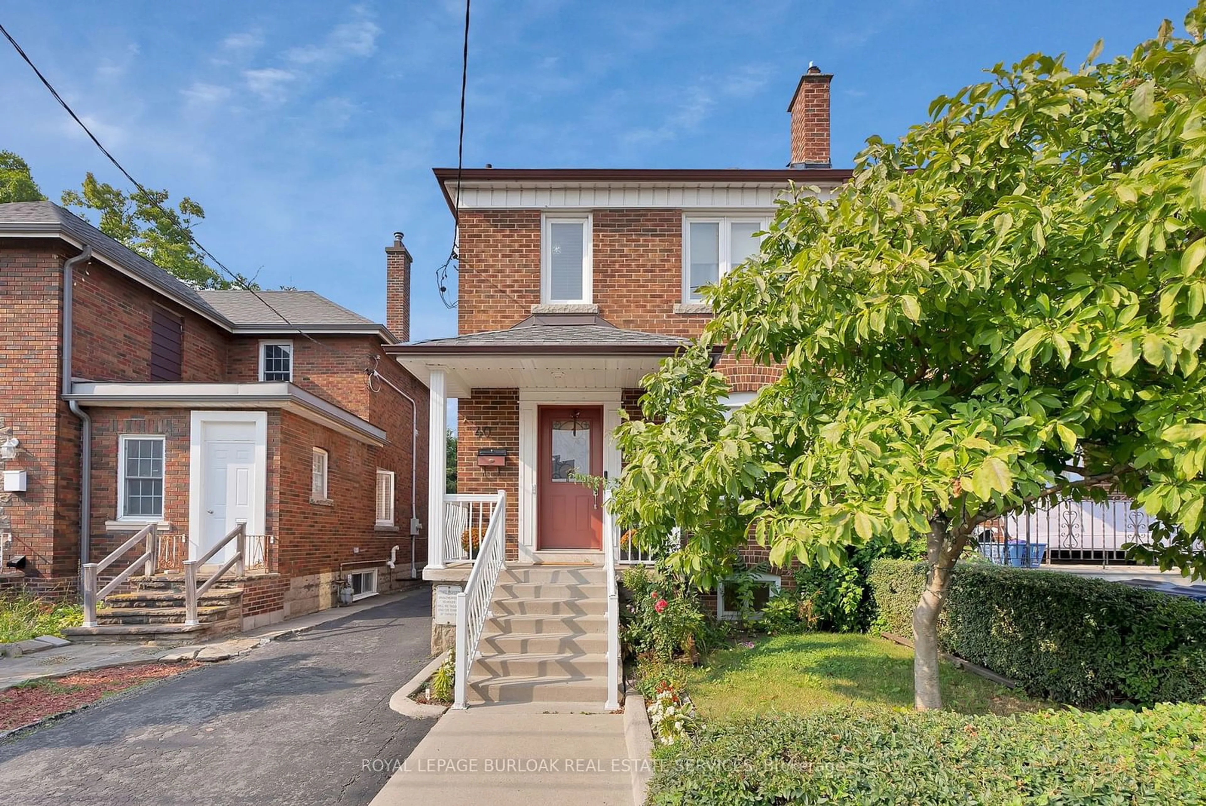 Frontside or backside of a home, the street view for 40 Rogers Rd, Toronto Ontario M6E 1N7