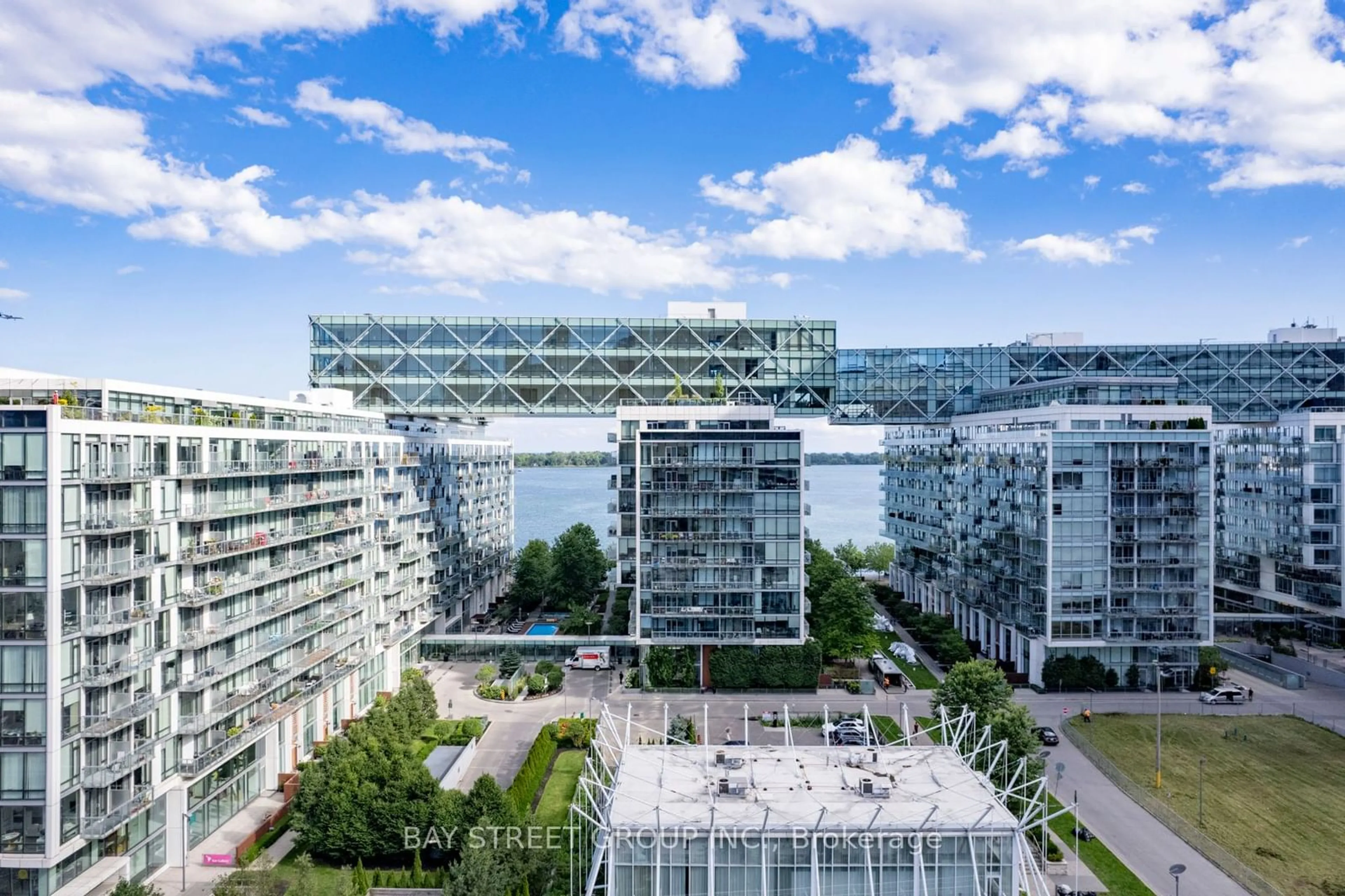 A pic from exterior of the house or condo, the view of city buildings for 39 Queens Quay #106, Toronto Ontario M5E 0A5