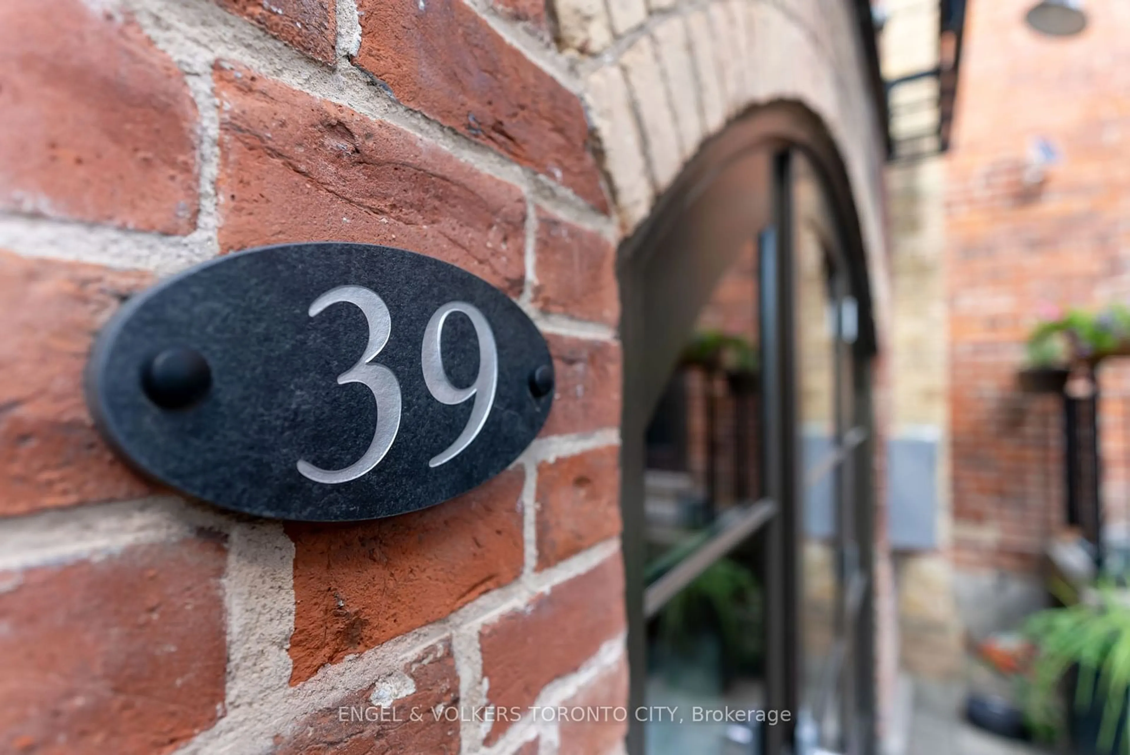 Home with brick exterior material for 39 Old Brewery Lane #4, Toronto Ontario M5A 3P2