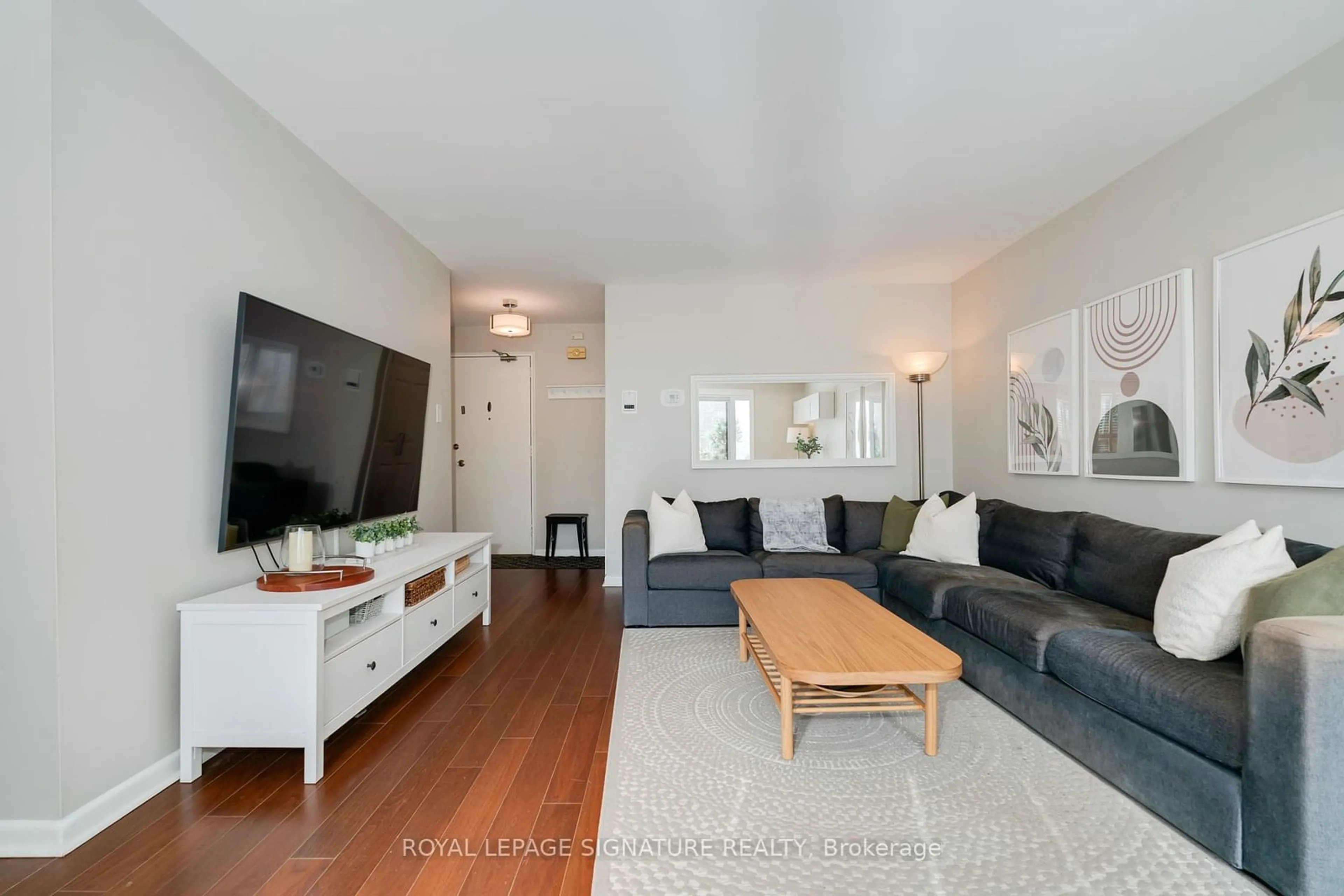 Living room, wood floors for 48 Three Valleys Dr #2, Toronto Ontario M3A 3B5