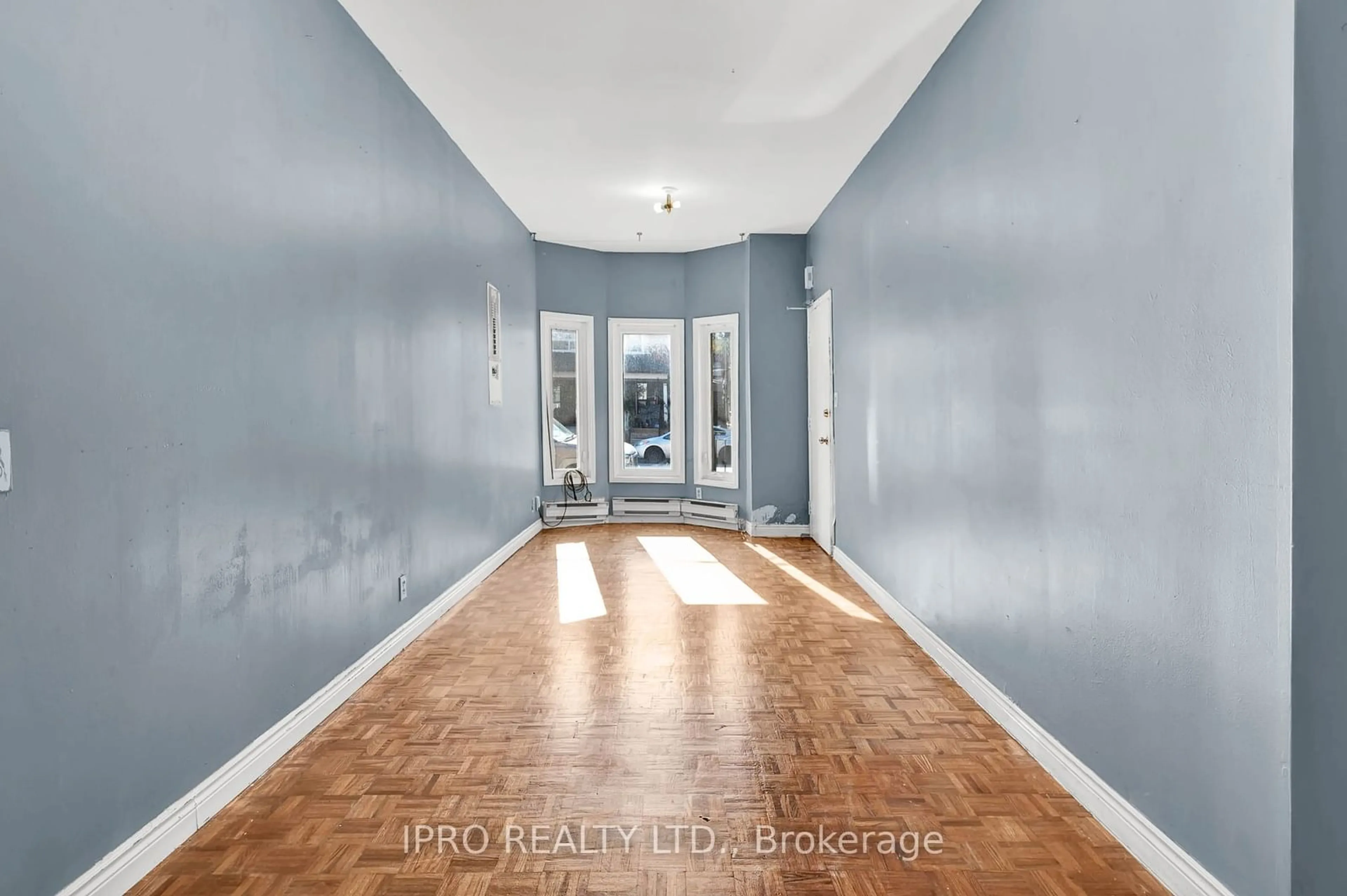 Indoor entryway, wood floors for 1244 College St, Toronto Ontario M6H 1C2