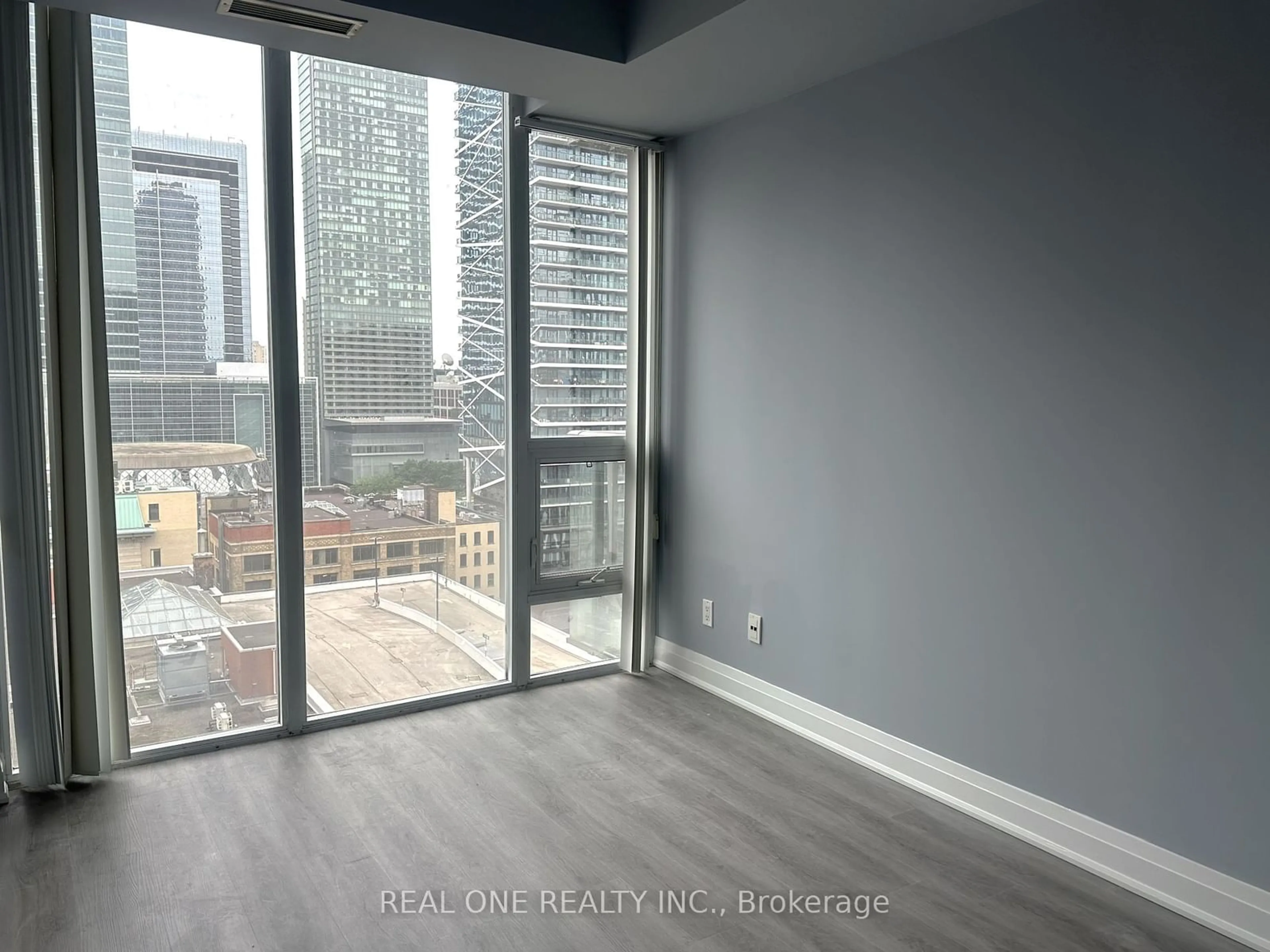 A pic of a room, not visible floor for 126 Simcoe St #1408, Toronto Ontario M5H 4E6