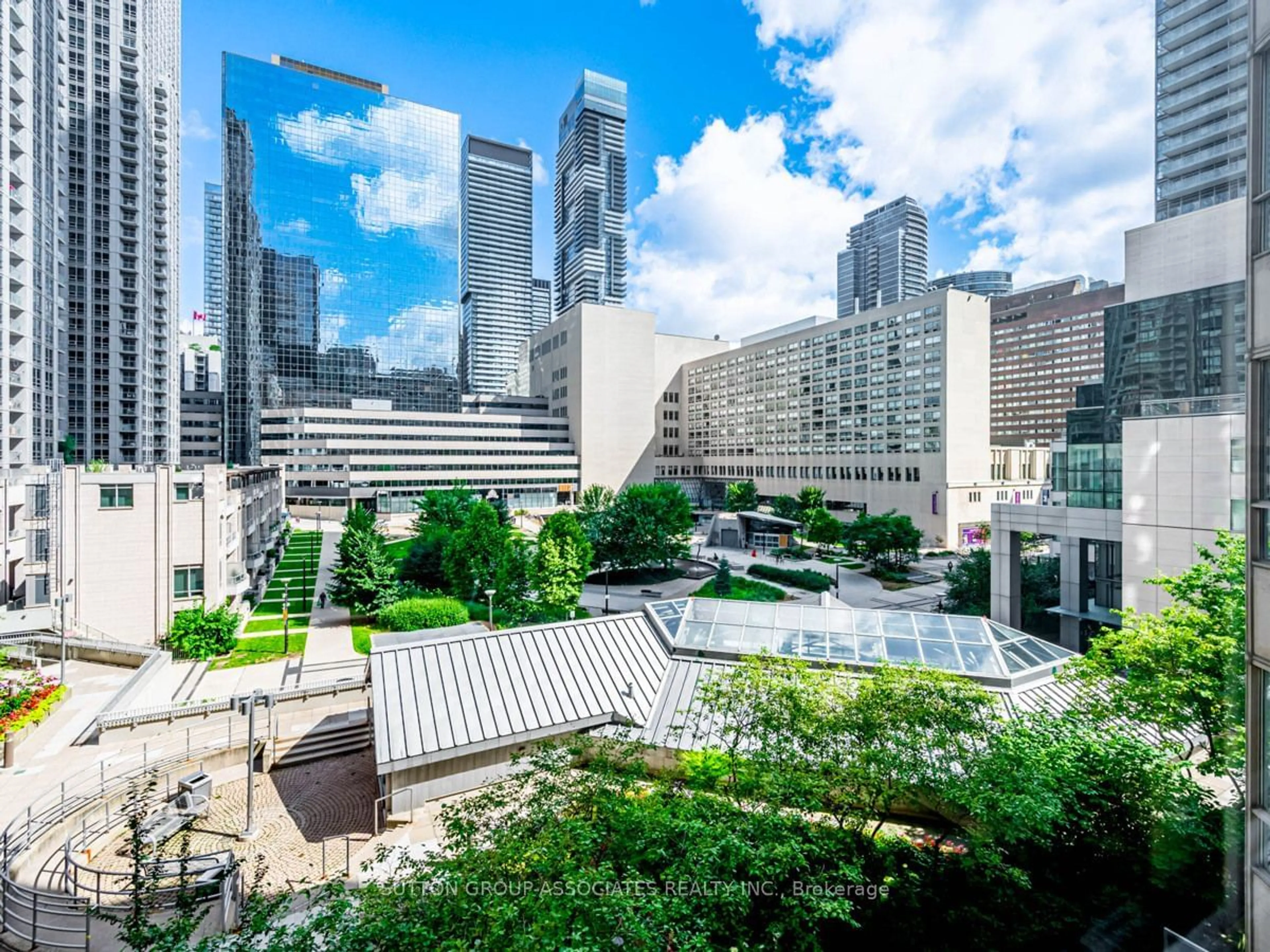 Patio, the view of city buildings for 44 Gerrard St #604, Toronto Ontario M5G 2K2