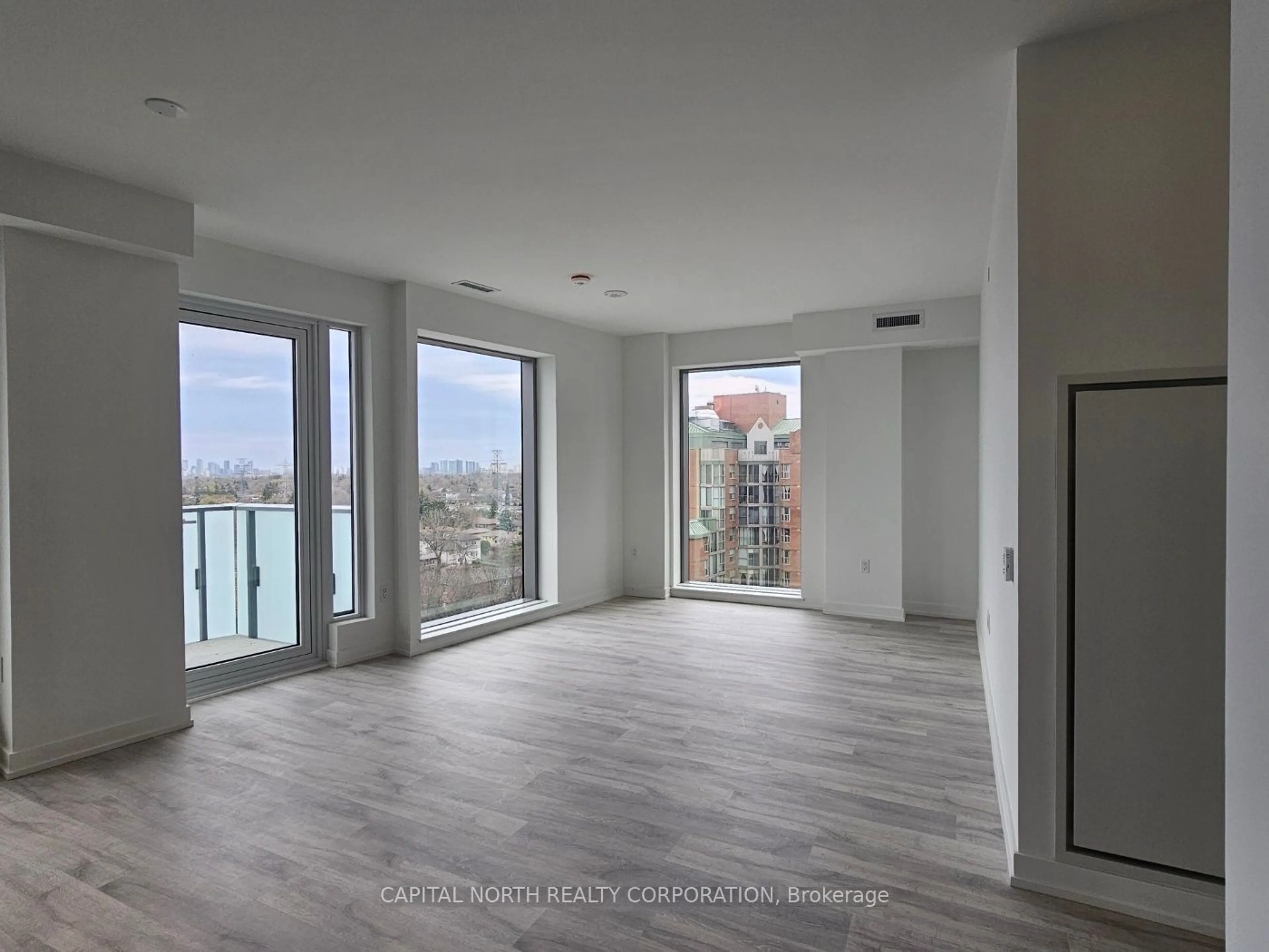 A pic of a room, wood floors for 8 Olympic Garden Dr #1006, Toronto Ontario M2M 0B9