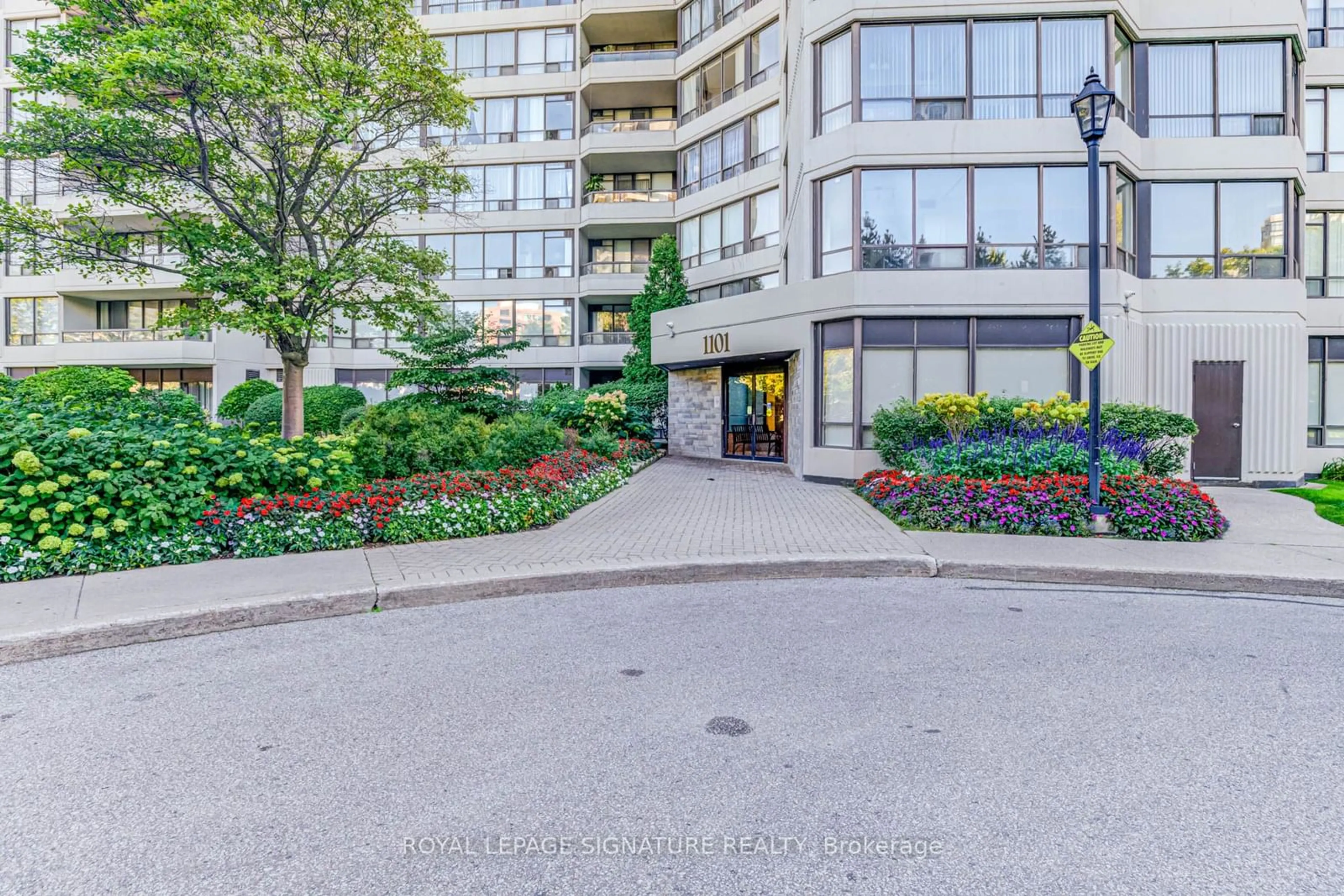 A pic from exterior of the house or condo, the street view for 1101 Steeles Ave #1201, Toronto Ontario M2R 3W5