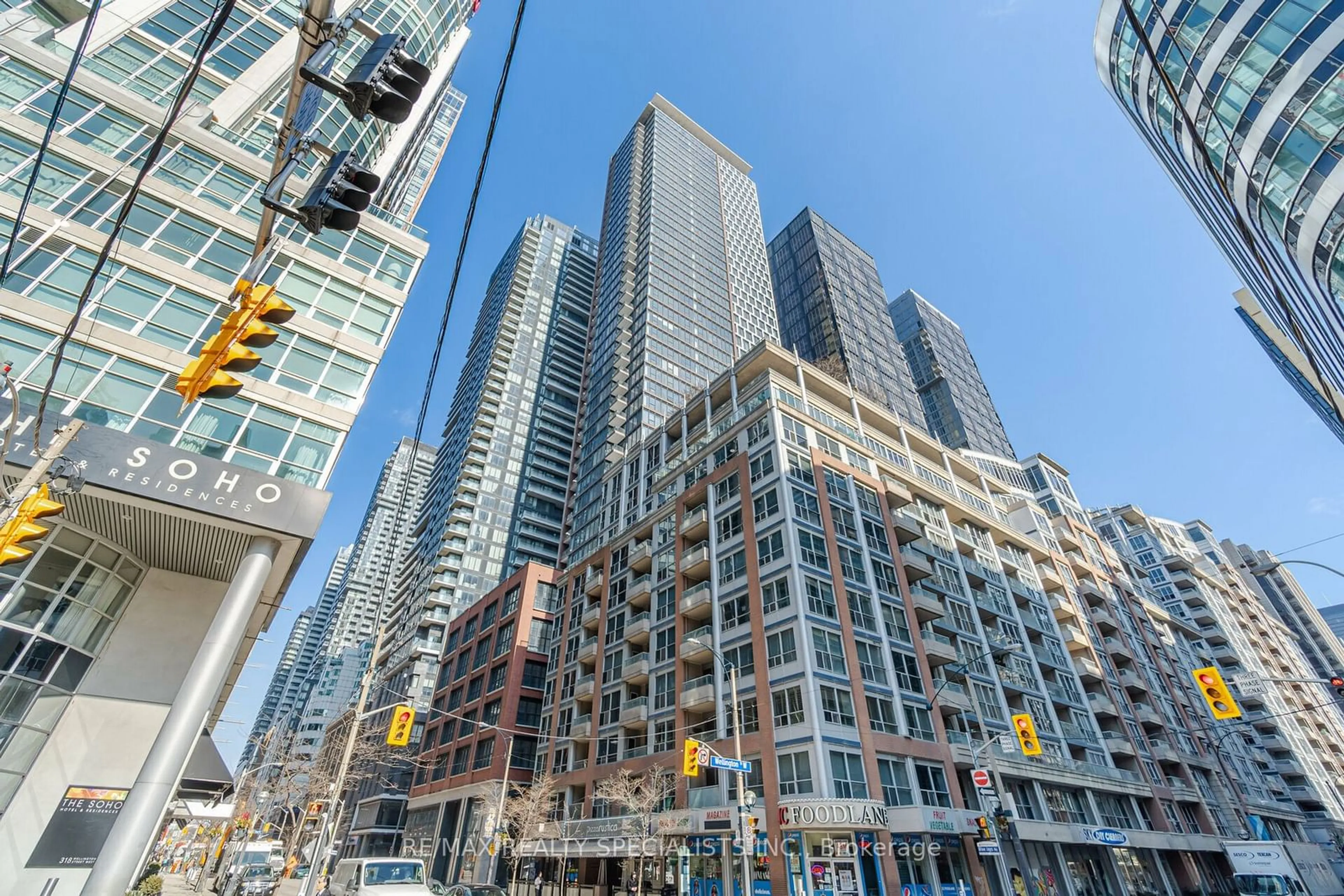 A pic from exterior of the house or condo, the view of city buildings for 55 Mercer St #1512, Toronto Ontario M5V 3W2