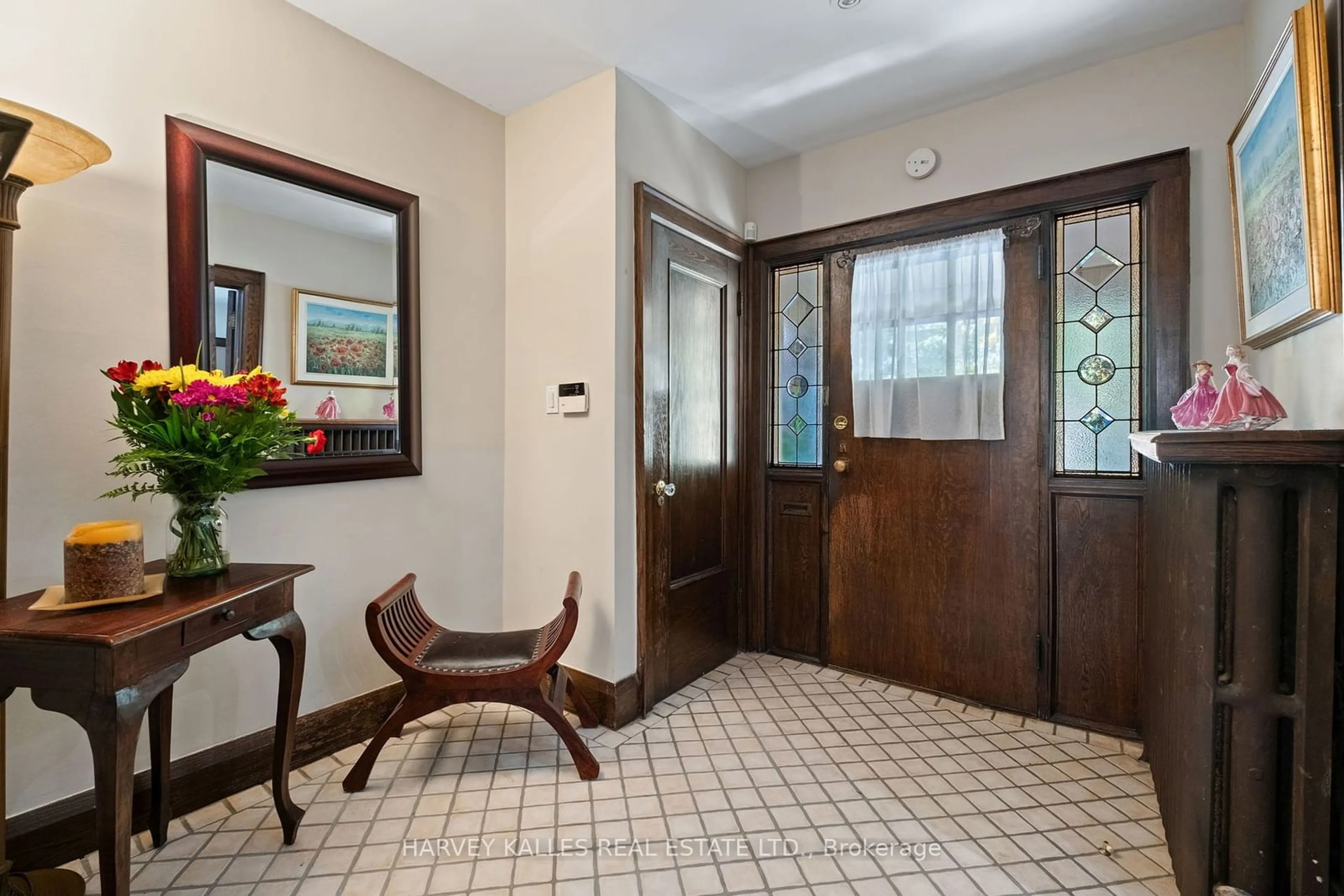 Indoor foyer, wood floors for 51 Glenholme Ave, Toronto Ontario M6H 3A8