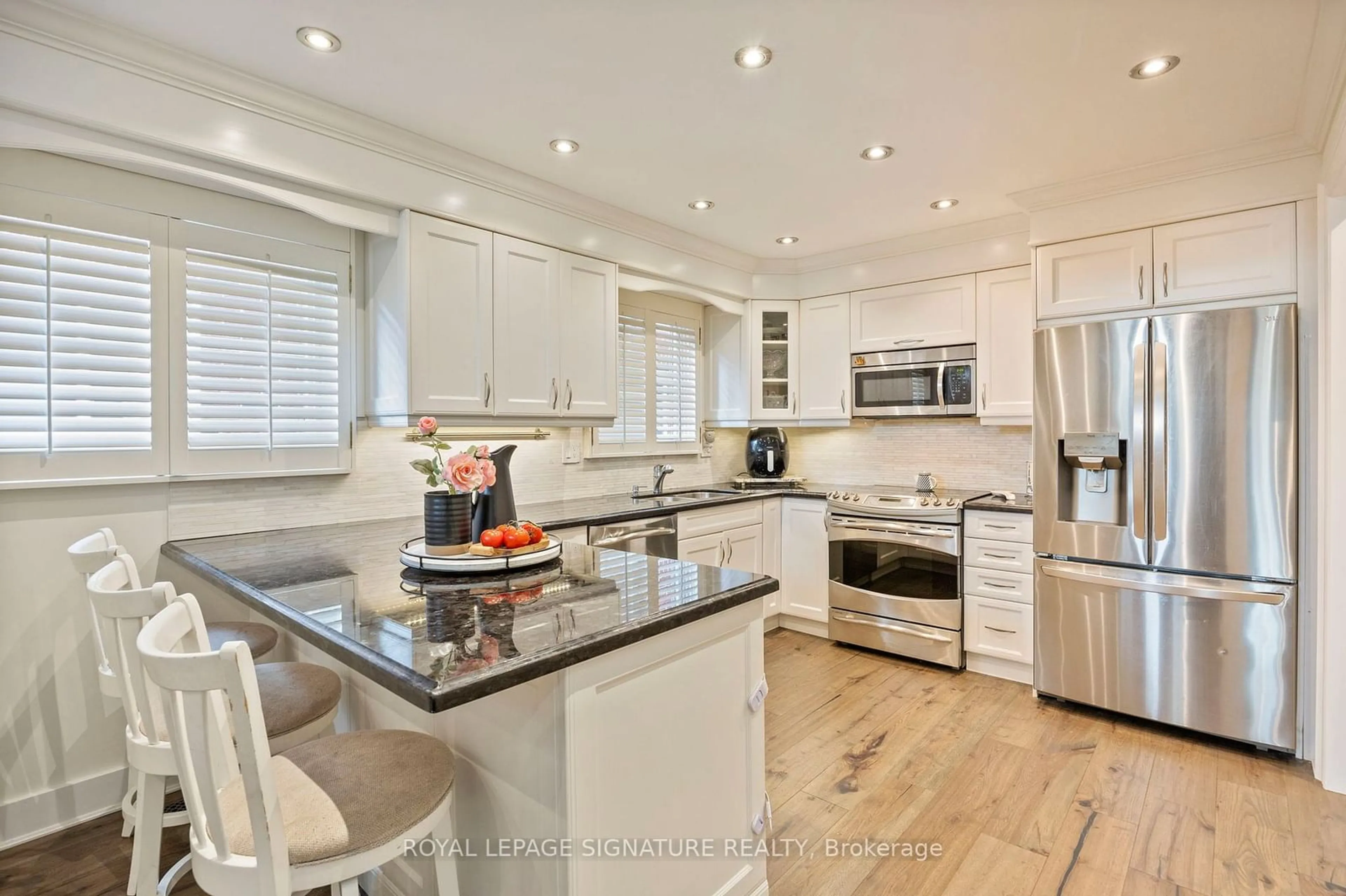 Open concept kitchen for 96 Carnival Crt, Toronto Ontario M2R 3T8