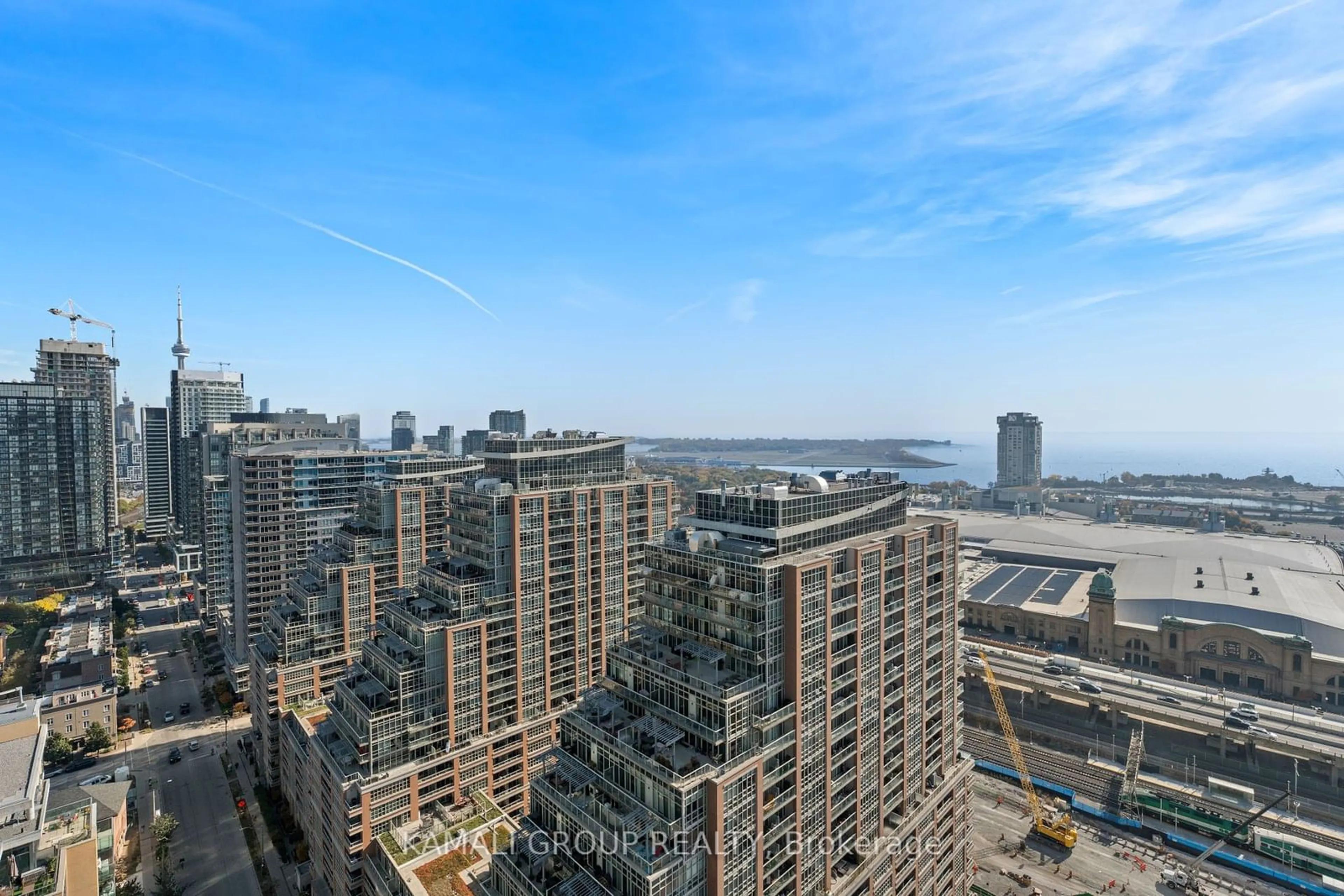 A pic from exterior of the house or condo, the view of city buildings for 135 East Liberty St #2411, Toronto Ontario M6K 0G7