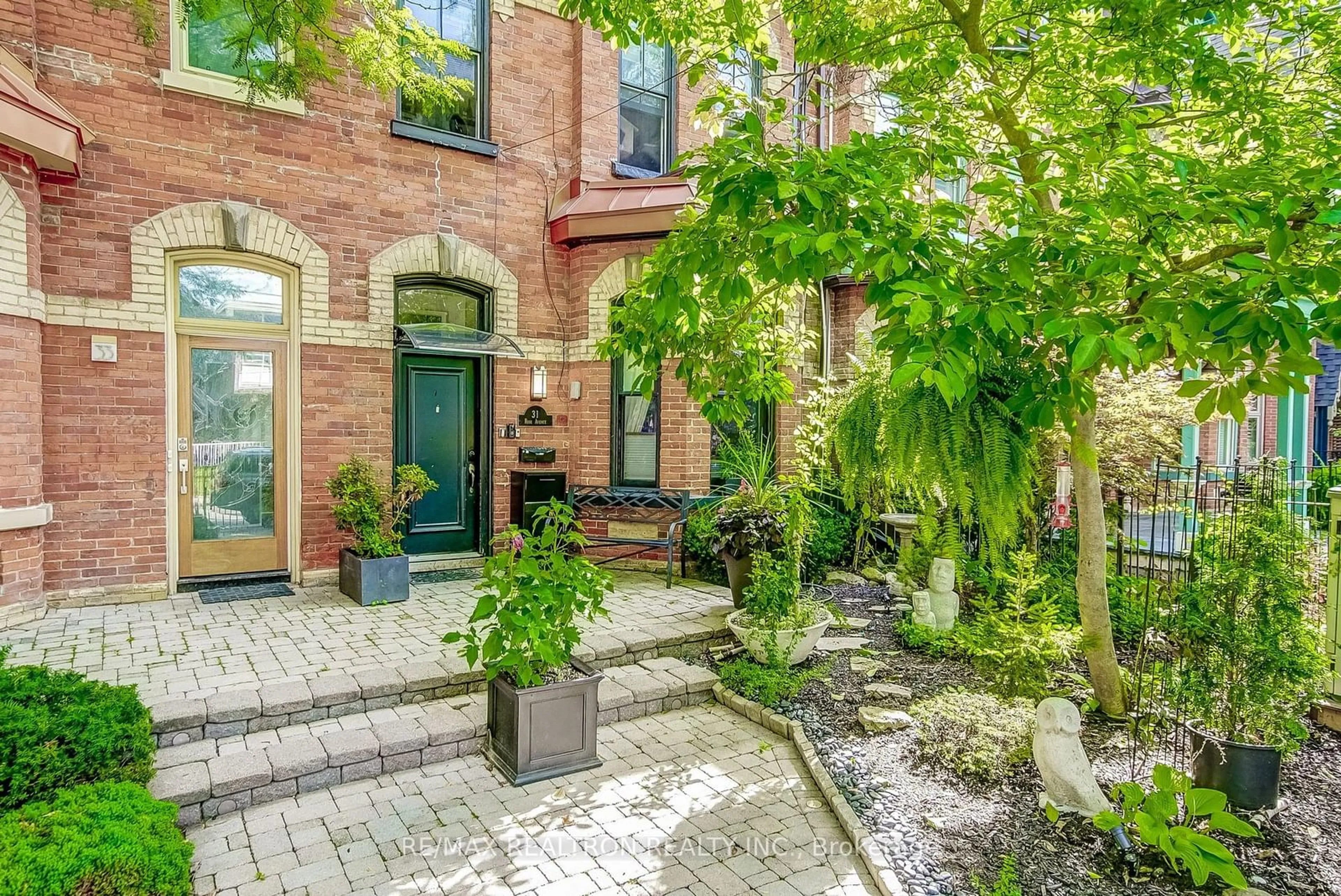 Home with brick exterior material for 31 Rose Ave, Toronto Ontario M4X 1N7