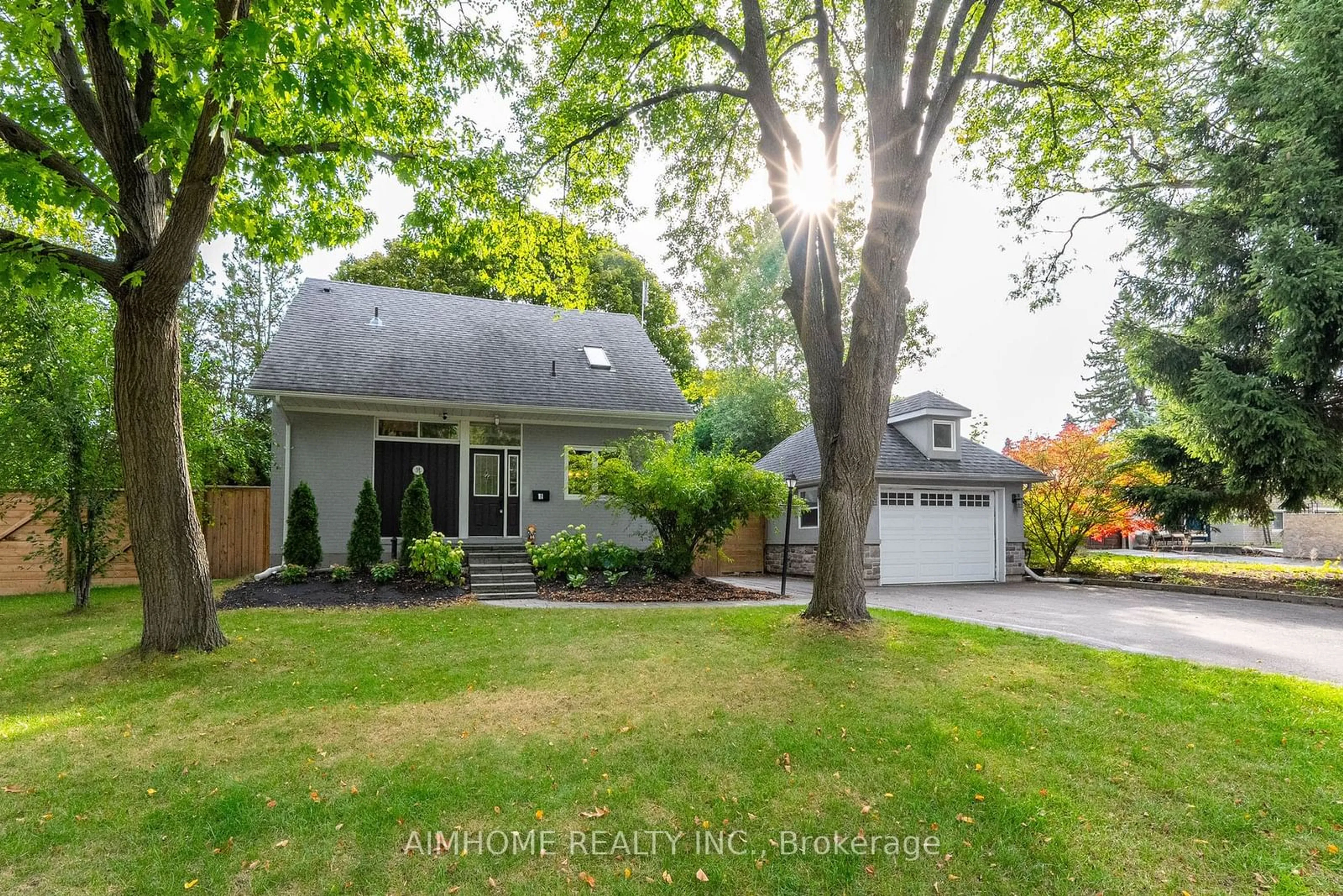 Frontside or backside of a home, the fenced backyard for 39 Addison Cres, Toronto Ontario M3B 1K7