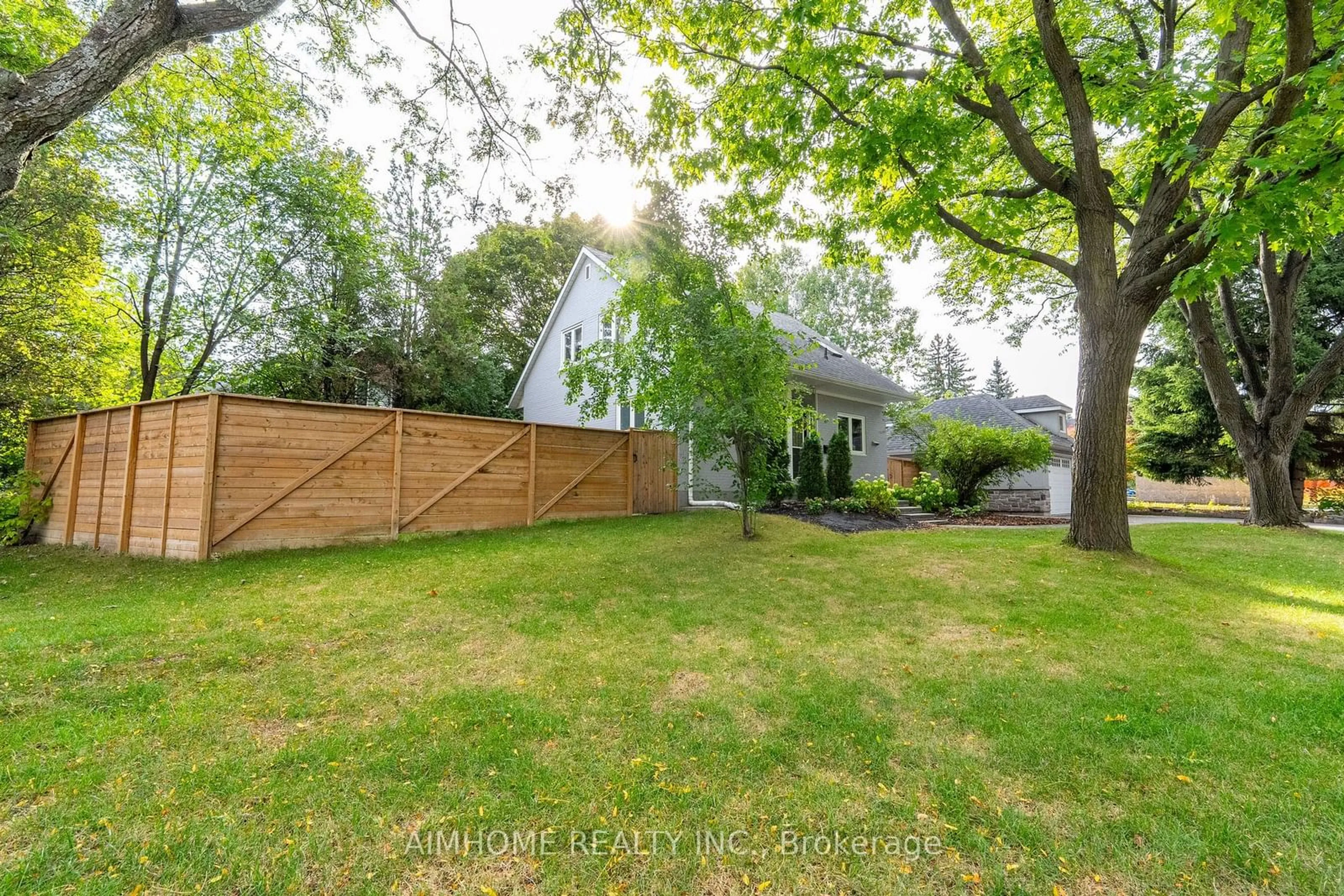 Frontside or backside of a home, the fenced backyard for 39 Addison Cres, Toronto Ontario M3B 1K7