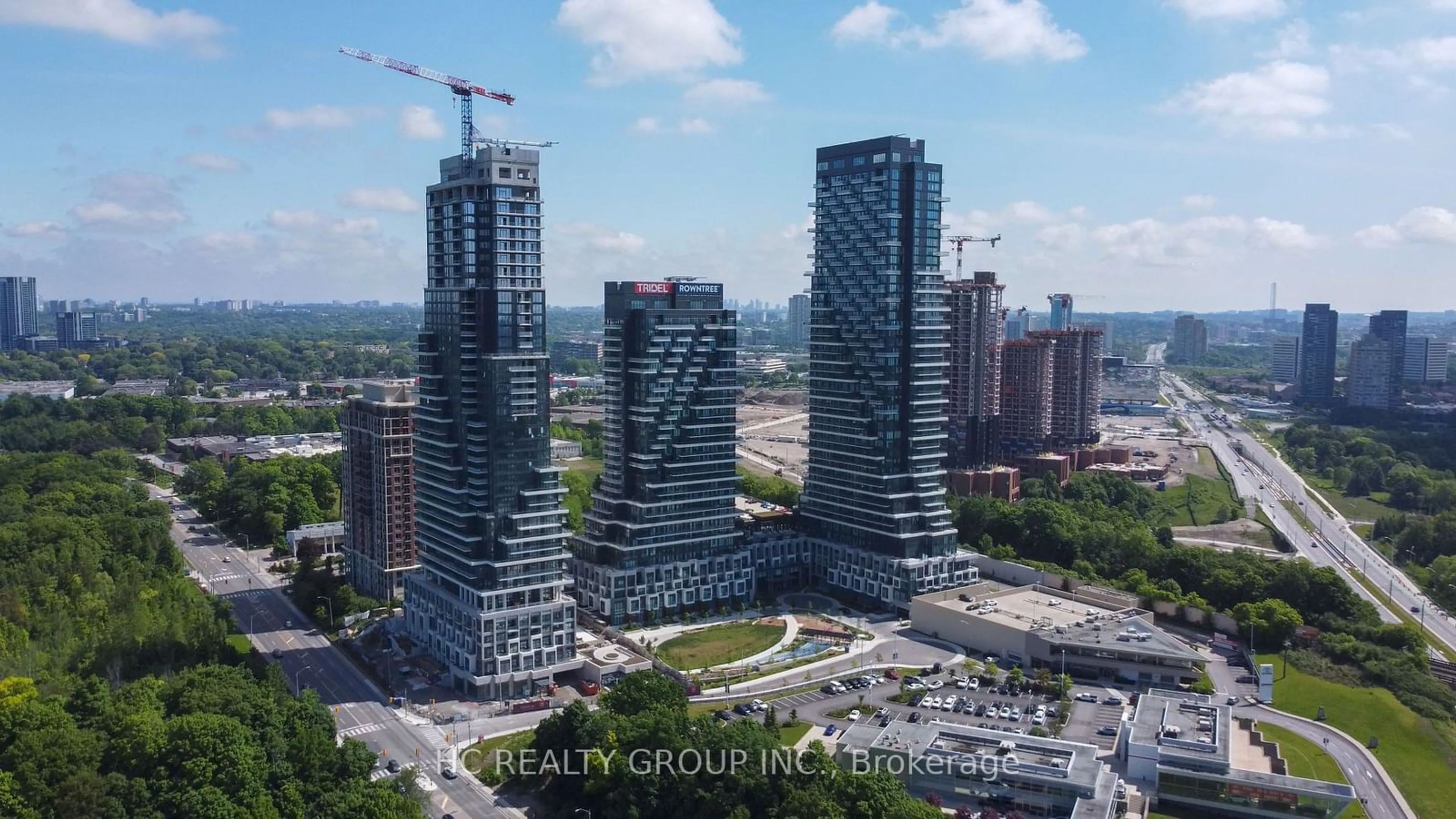 A pic from exterior of the house or condo, the view of city buildings for 20 Inn on the Park Dr #133, Toronto Ontario M3C 0P8