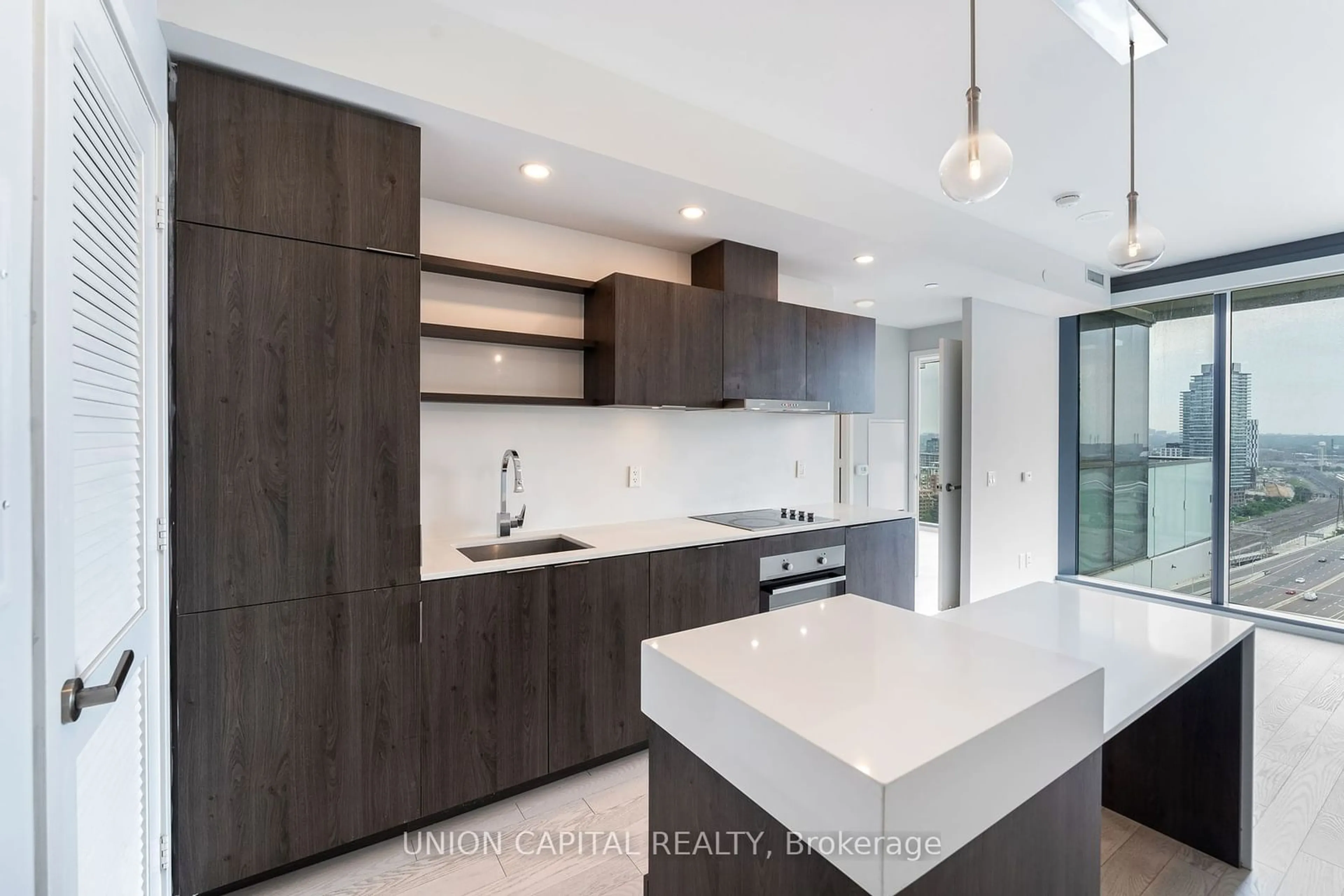 Contemporary kitchen, wood floors, mountain for 16 Bonnycastle St #2007, Toronto Ontario M5A 0C9