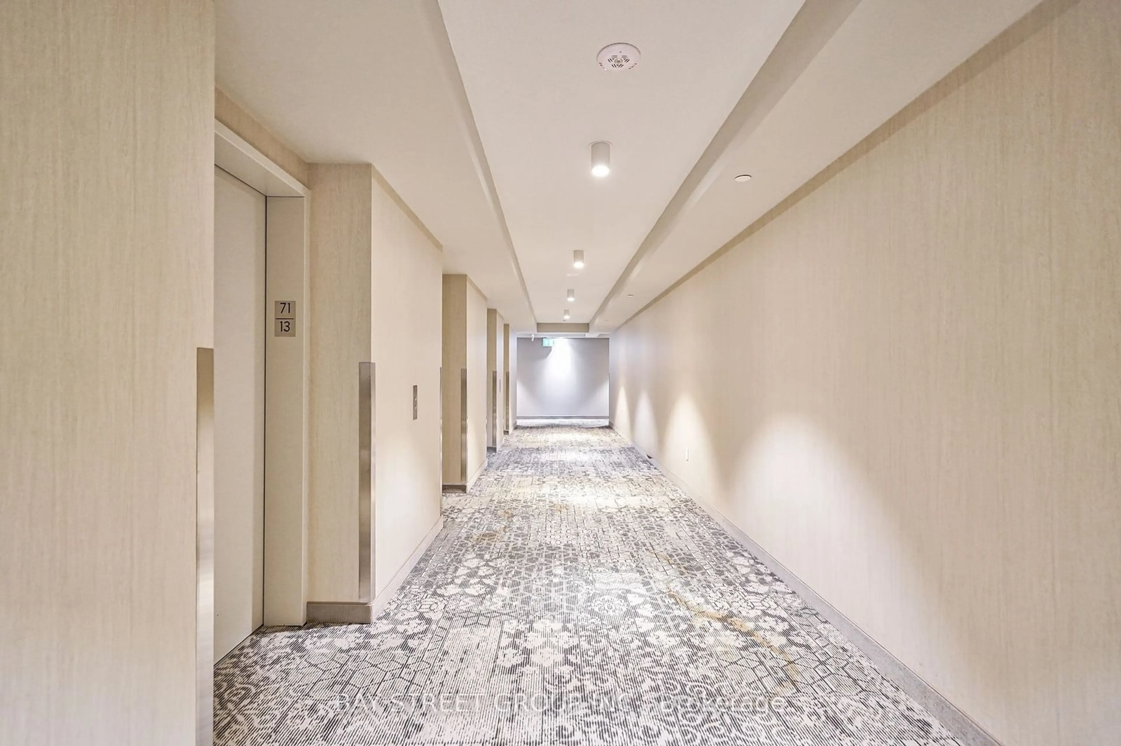 Indoor foyer, cement floor for 55 Cooper St #7111, Toronto Ontario M5E 0G1