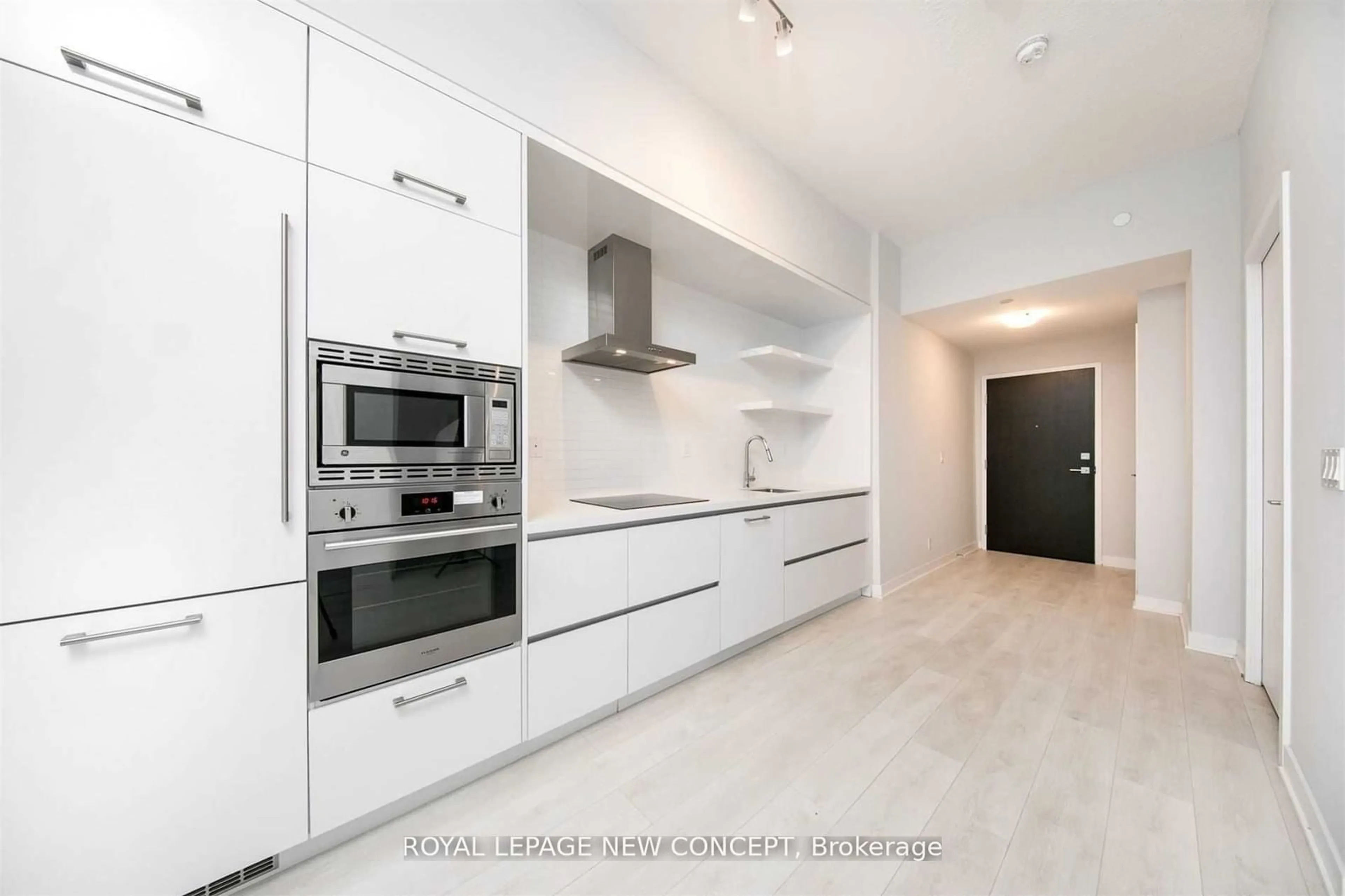 Contemporary kitchen, wood floors for 2221 Yonge St #3006, Toronto Ontario M4S 0B8