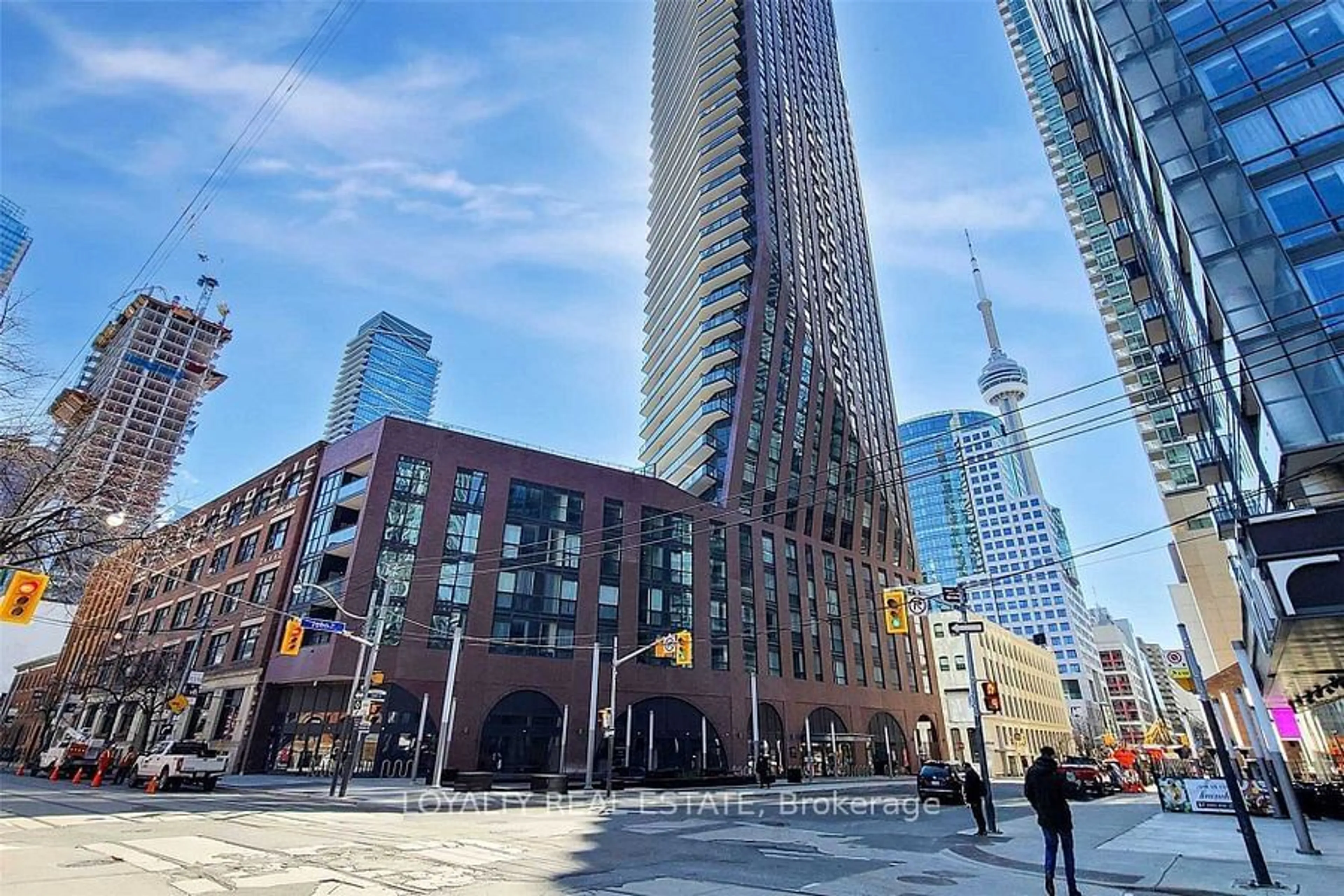 A pic from exterior of the house or condo, the view of city buildings for 99 John St #1106, Toronto Ontario M5V 0S6