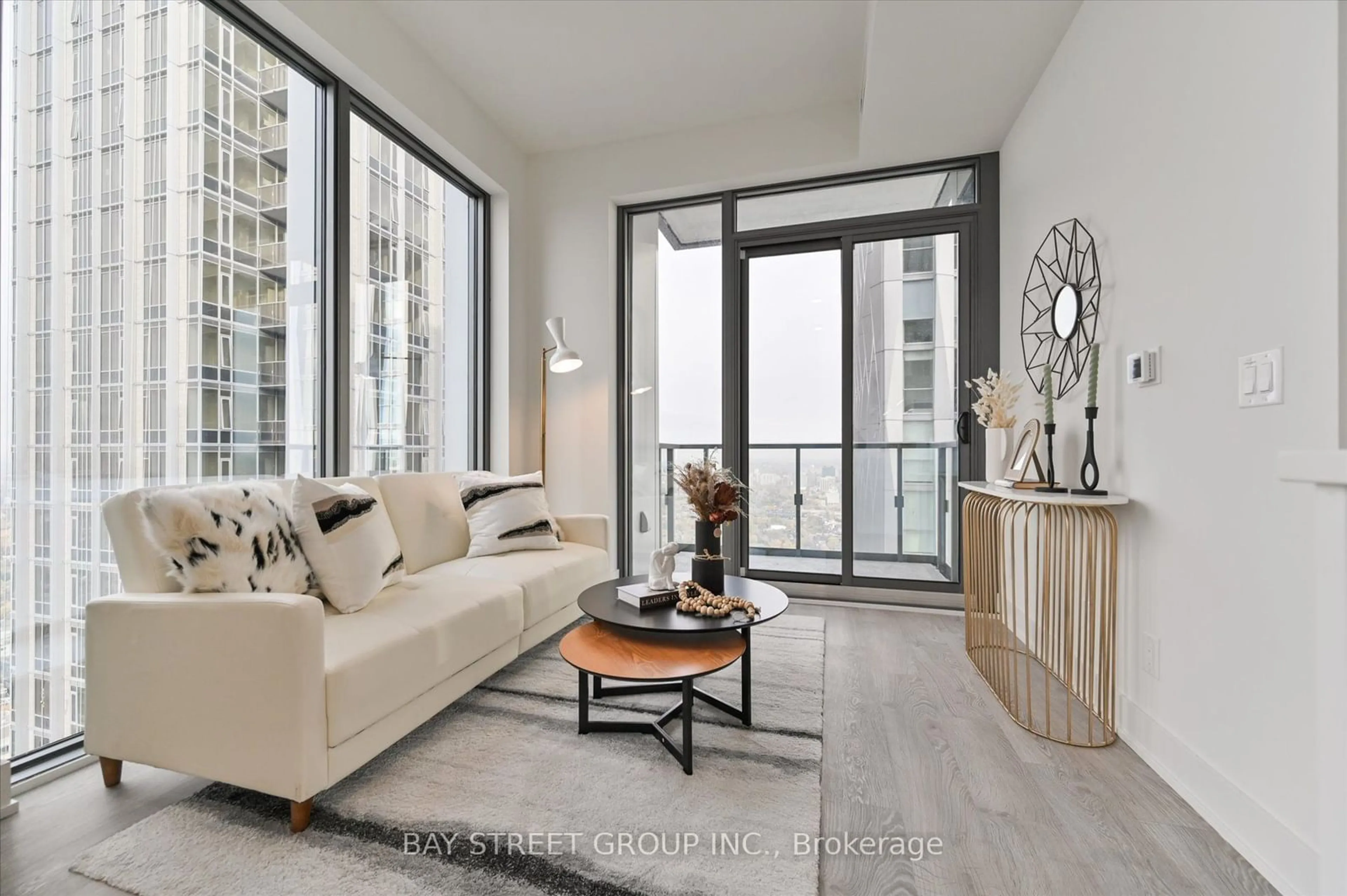 Living room, wood floors for 8 Cumberland St #4902, Toronto Ontario M4W 0B6