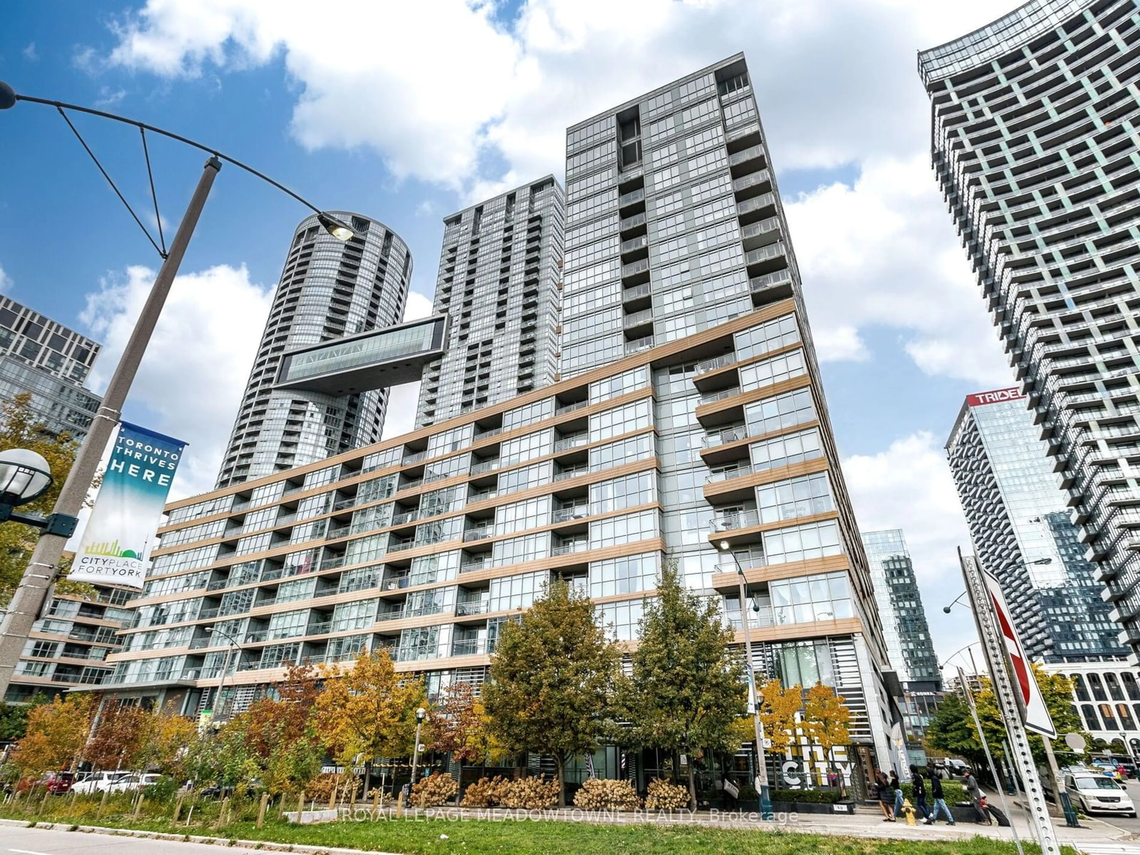 A pic from exterior of the house or condo, the view of city buildings for 10 Capreol Crt #305, Toronto Ontario M5V 4B3