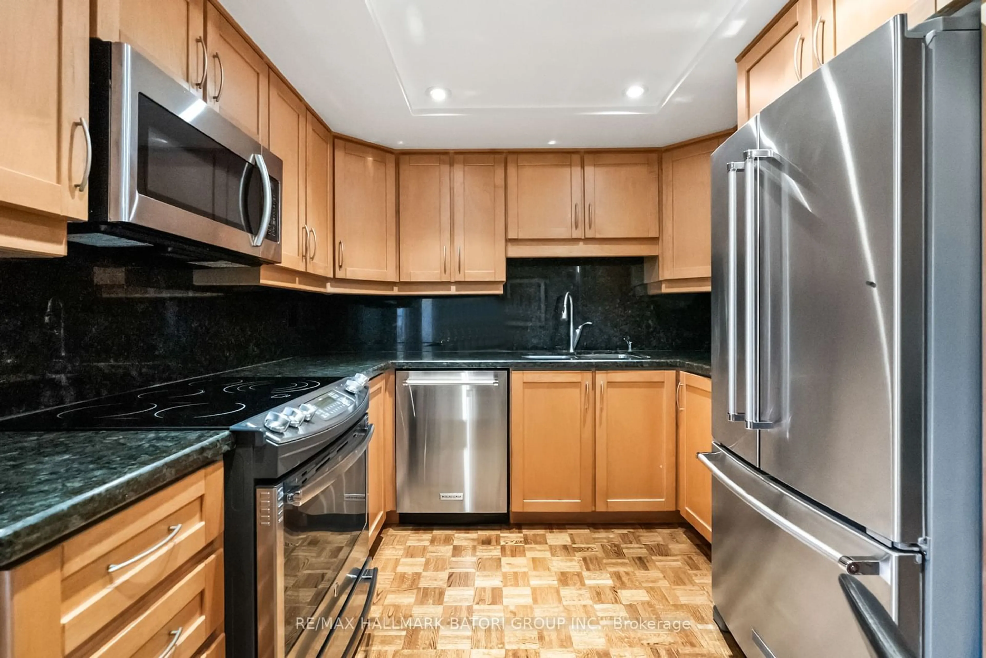 Standard kitchen, wood floors, cottage for 19 Lower Village Gate #504, Toronto Ontario M5P 3L9