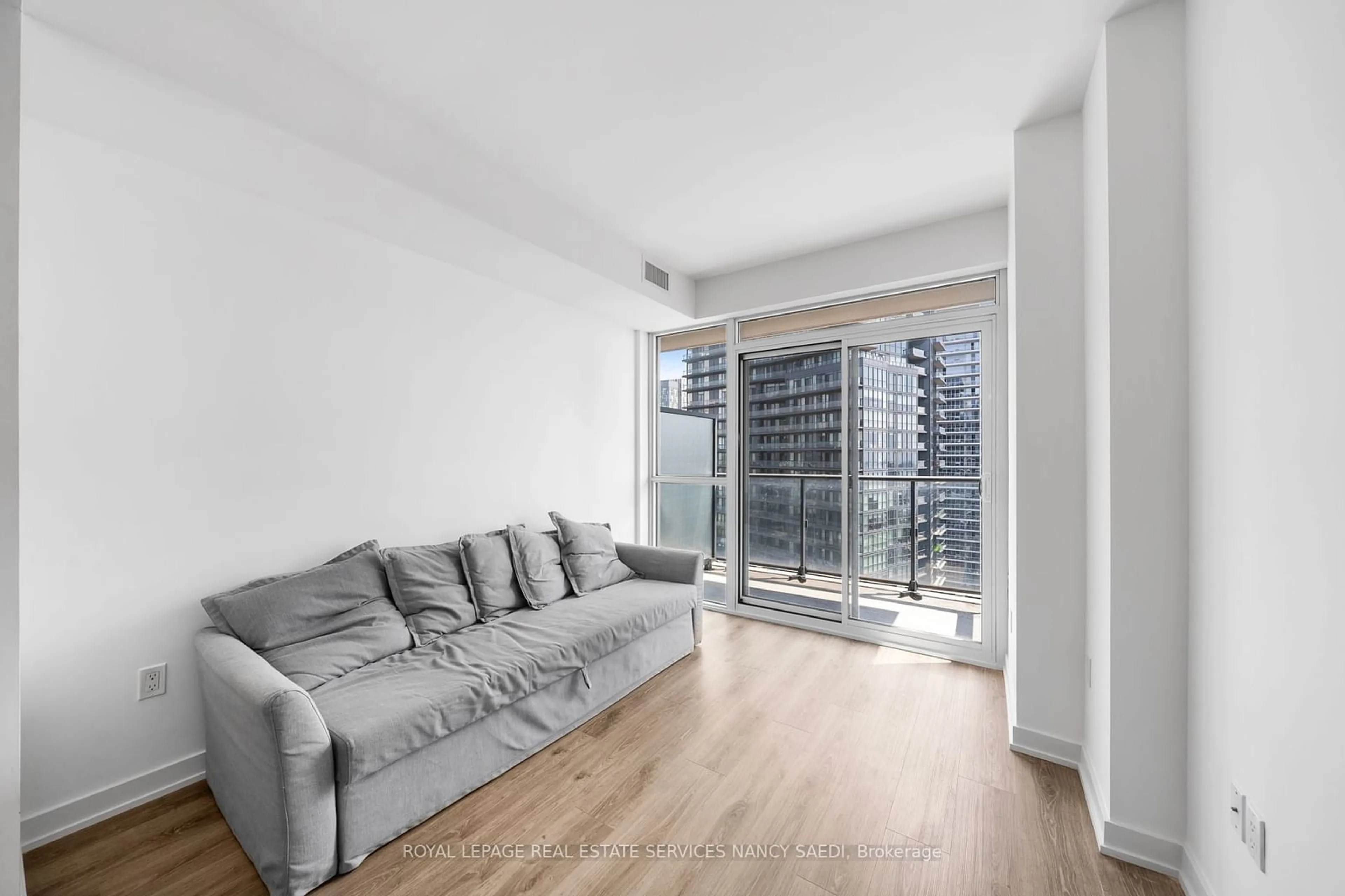 Living room, wood floors for 38 Iannuzzi St #2509, Toronto Ontario M4P 2E7