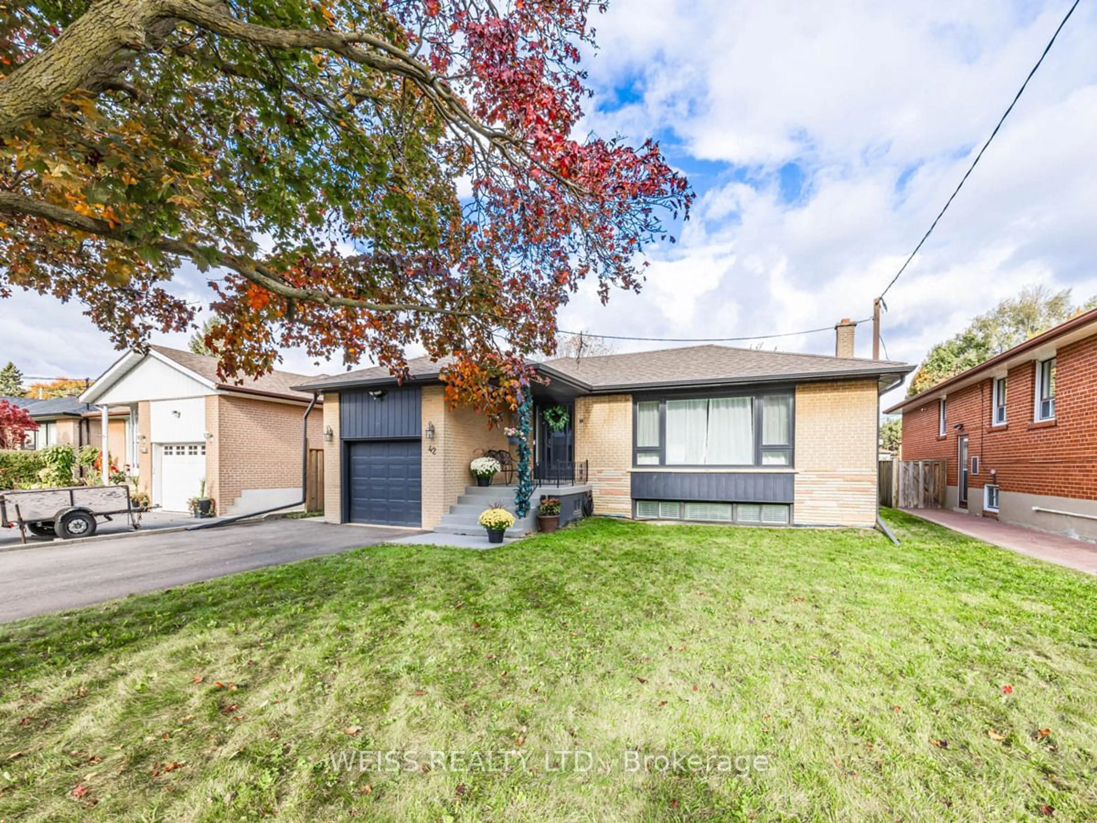 Frontside or backside of a home, the street view for 42 Barksdale Ave, Toronto Ontario M3H 4S5