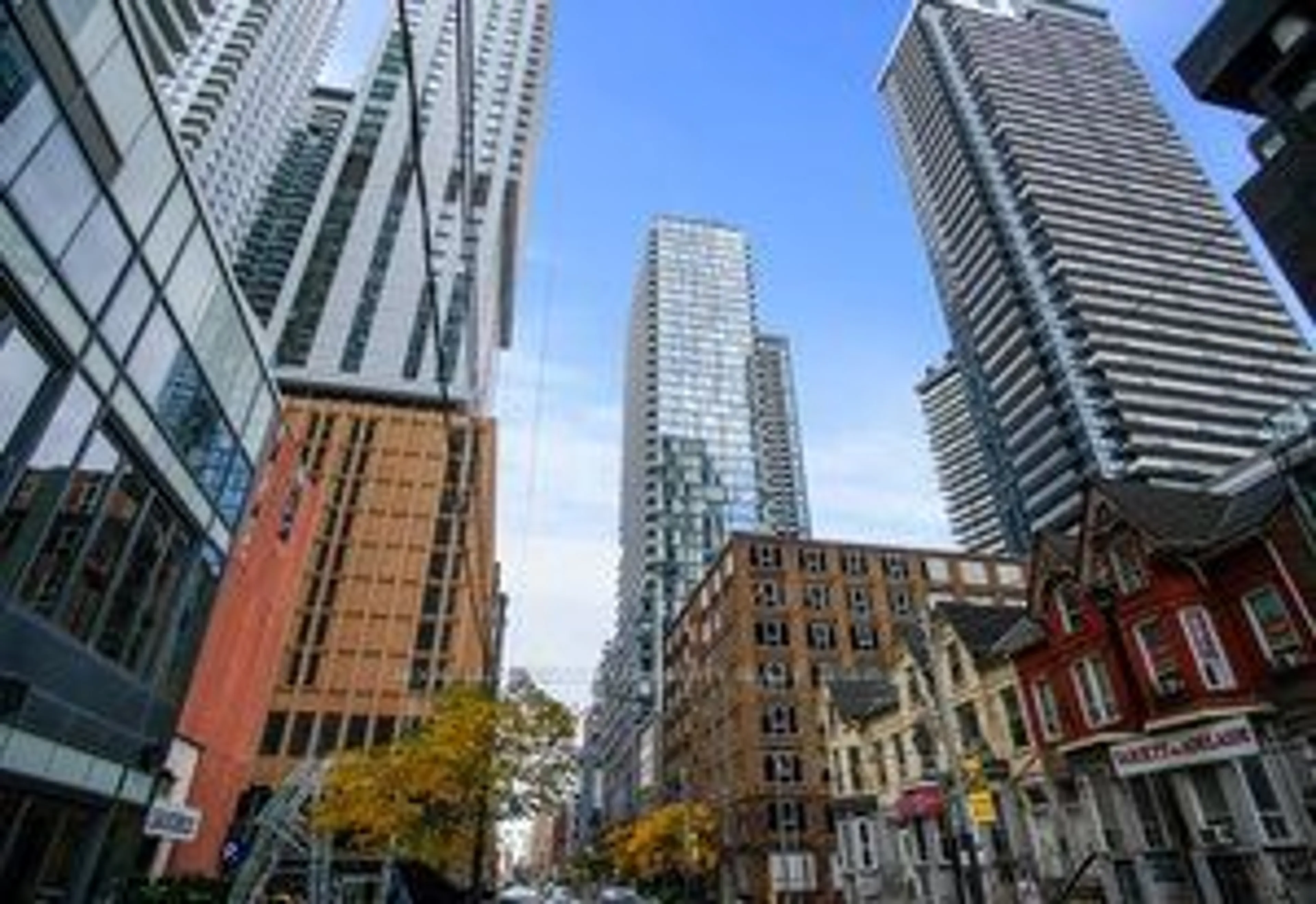 A pic from exterior of the house or condo, the view of city buildings for 101 Peter St #602, Toronto Ontario M5V 0G6