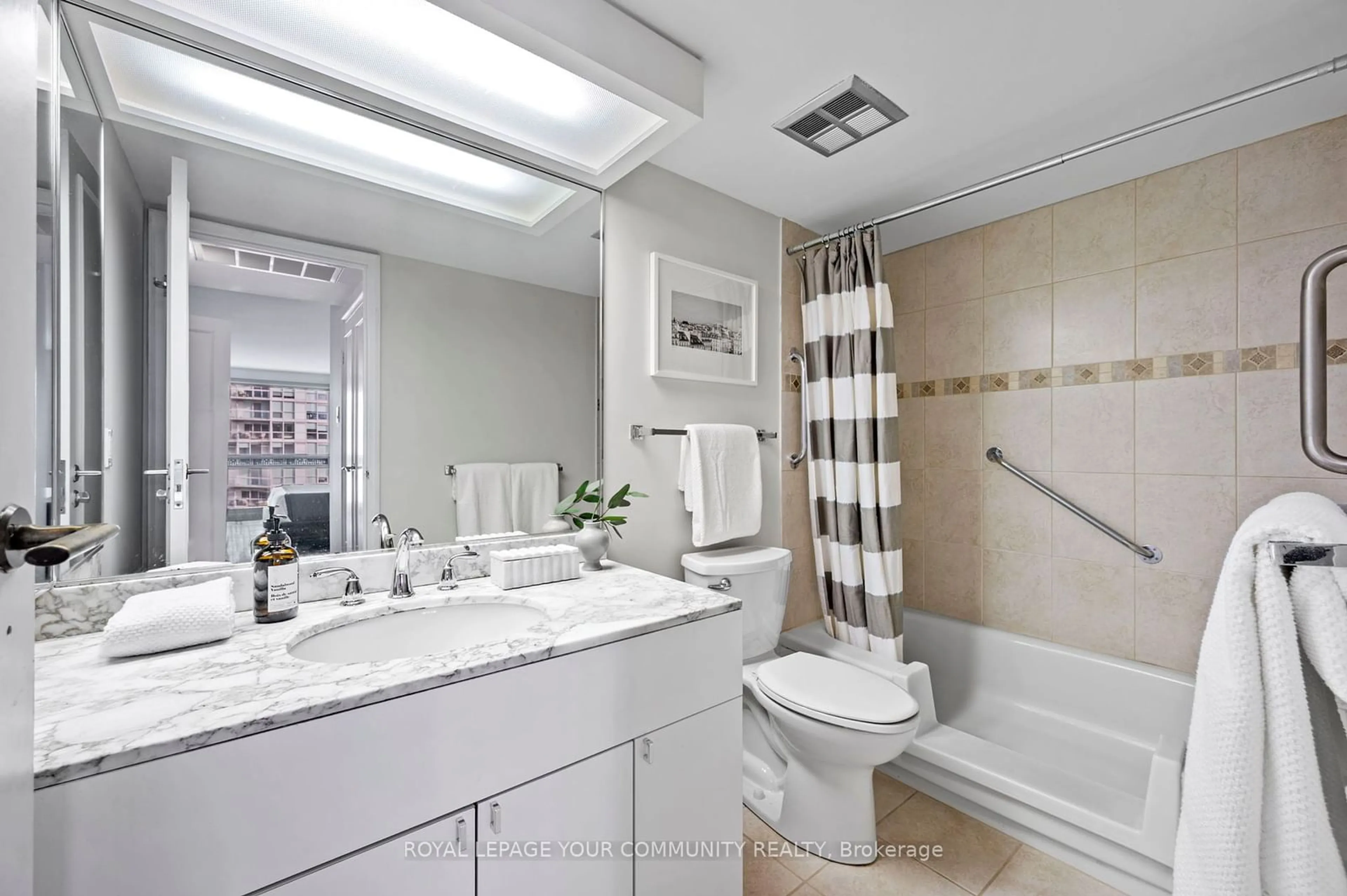 Bathroom, ceramic floors for 63 St Clair Ave #703, Toronto Ontario M4V 2Y9